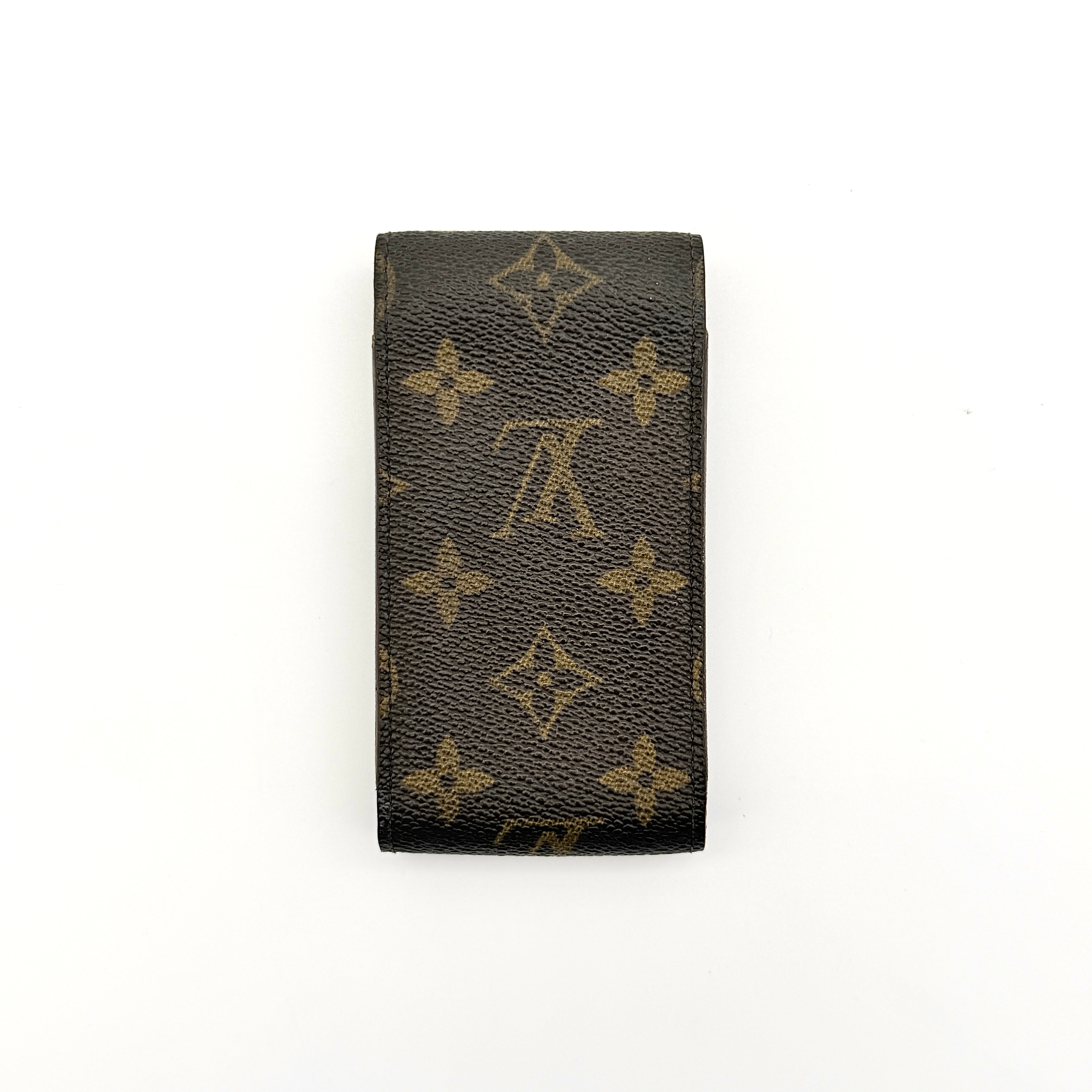 Louis Vuitton Monogram cigarette case in brown coated canvas with flap top, shown from the front.