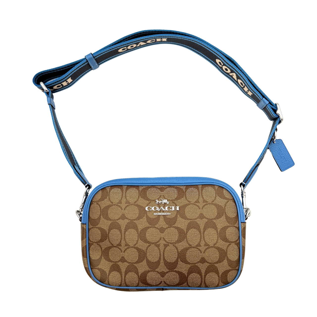 Coach Signature Jamie Crossbody Bag in beige and blue with bold logo webbing strap and blue leather trim, photographed against a white background.