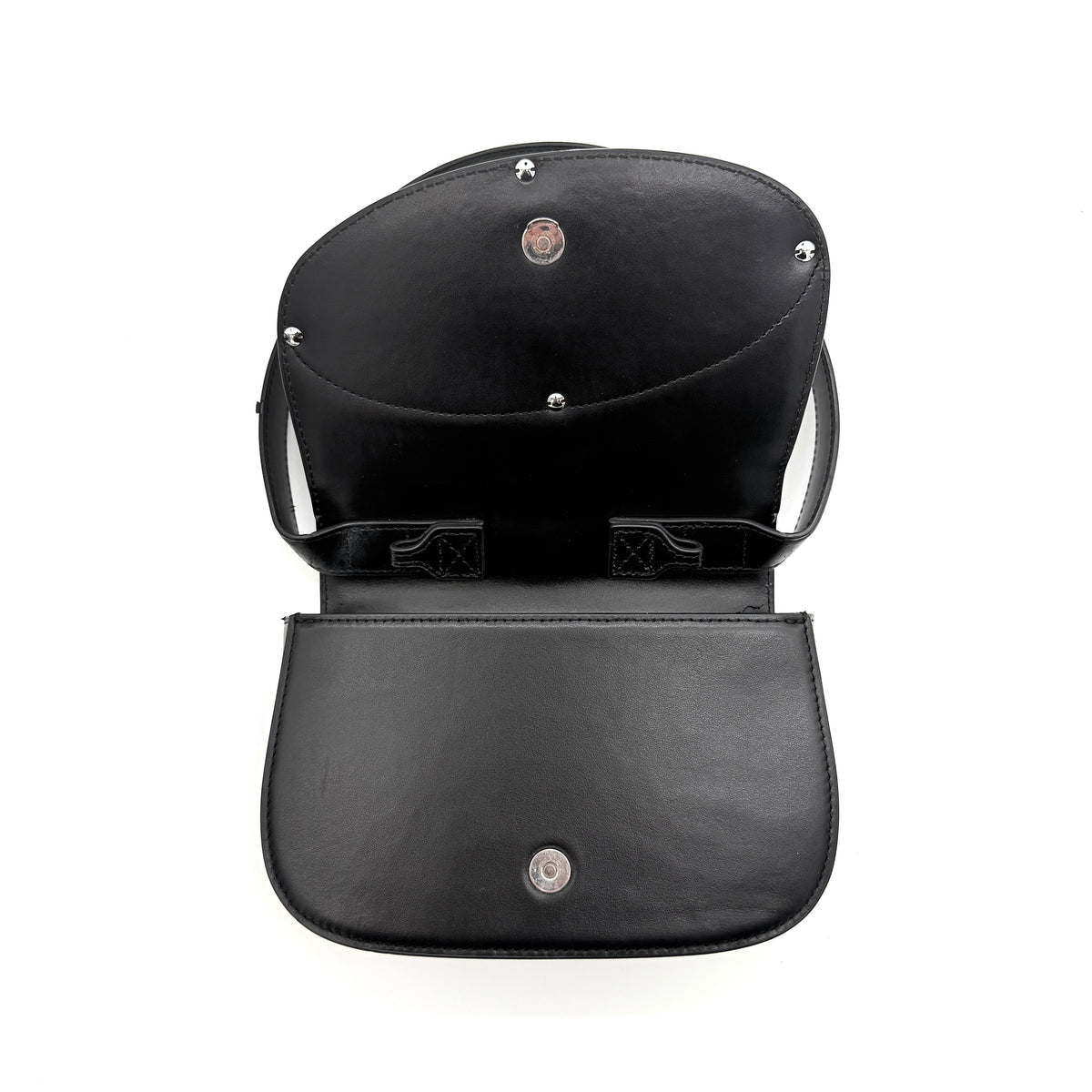 Diesel 1DR Shoulder Bag in black leather with a bold silver and black D logo plaque on the front flap.