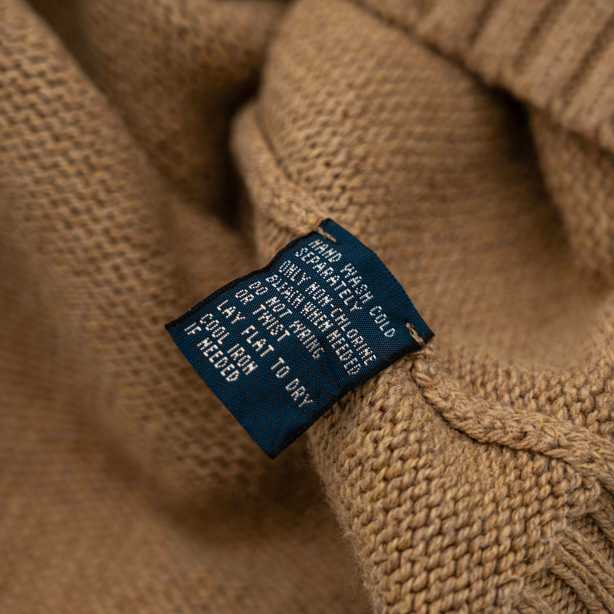 Polo Ralph Lauren brown Pima cotton knit crewneck sweater with embroidered pony logo, displayed flat.