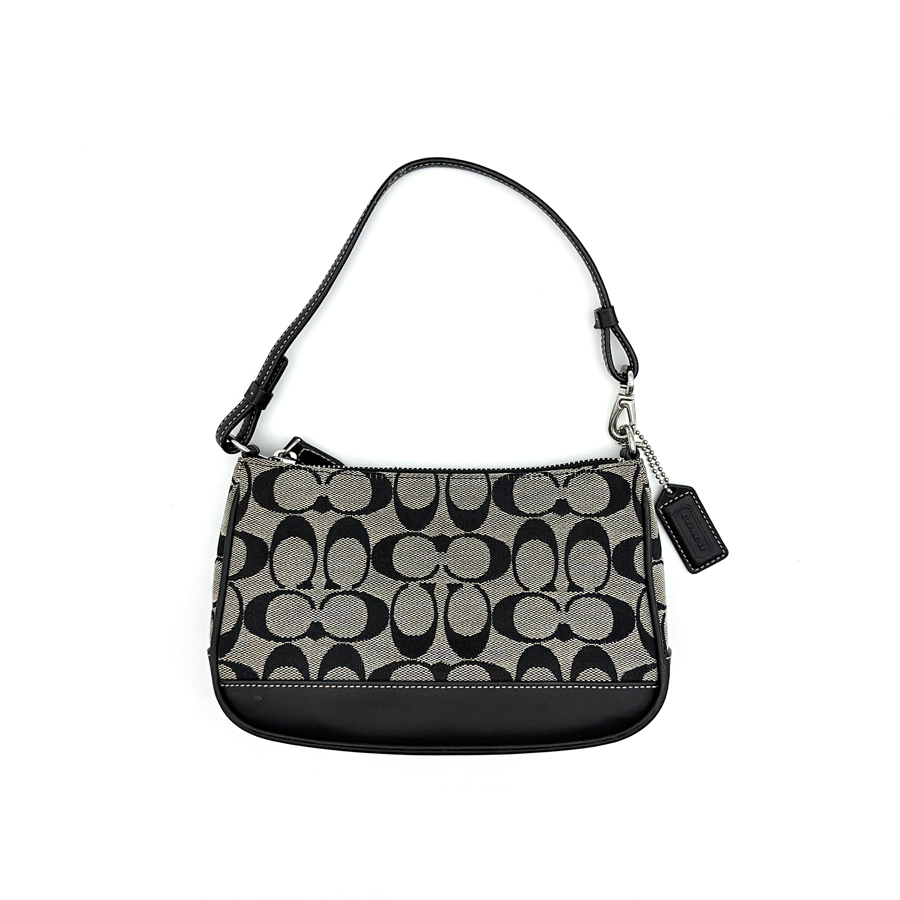 Coach Y2K Demi Shoulder Bag in grey and black signature jacquard with leather trim and silver hardware.