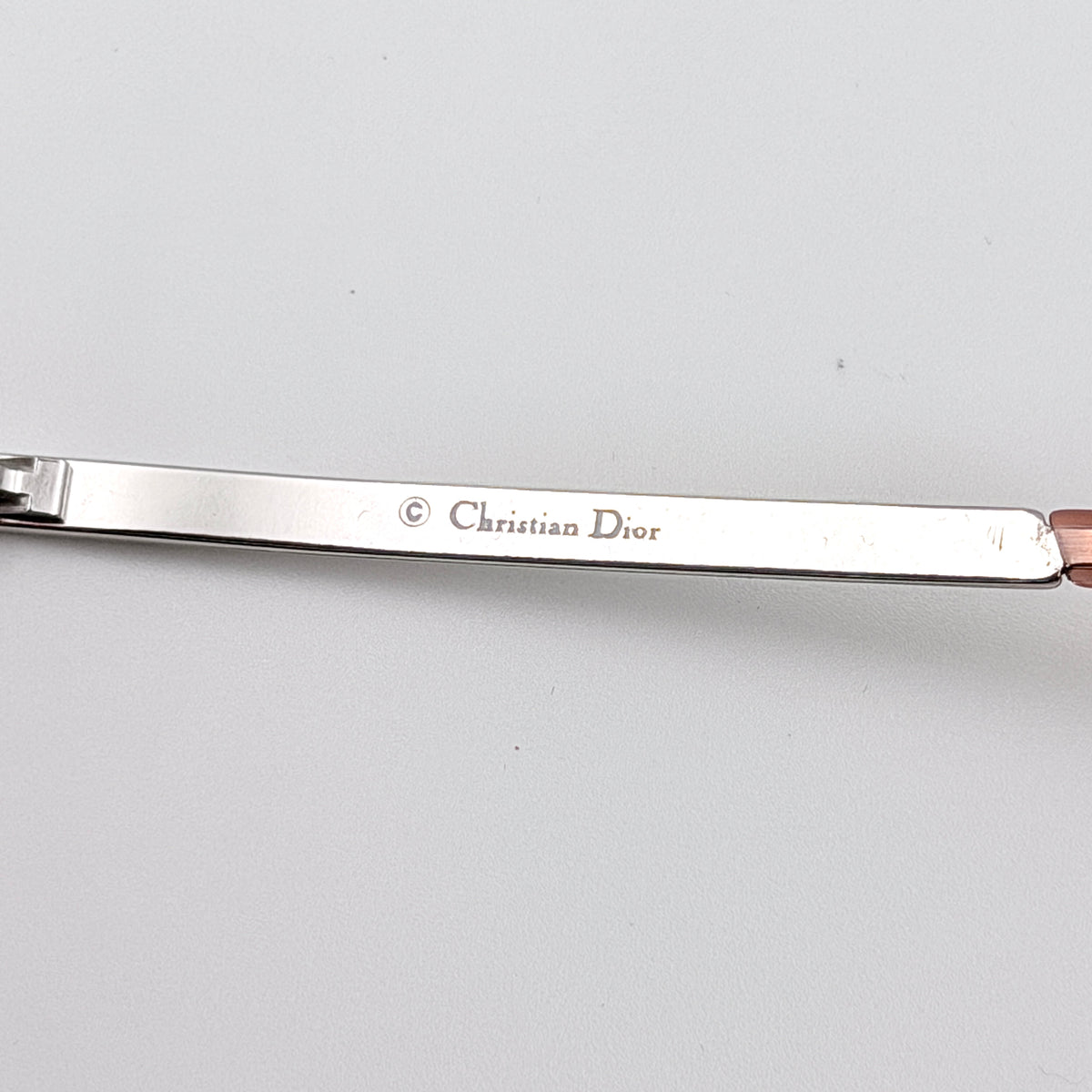 Dior Adiorable 3/L rimless sunglasses with rose pink gradient lenses and silver frame, presented with Dior hard case.