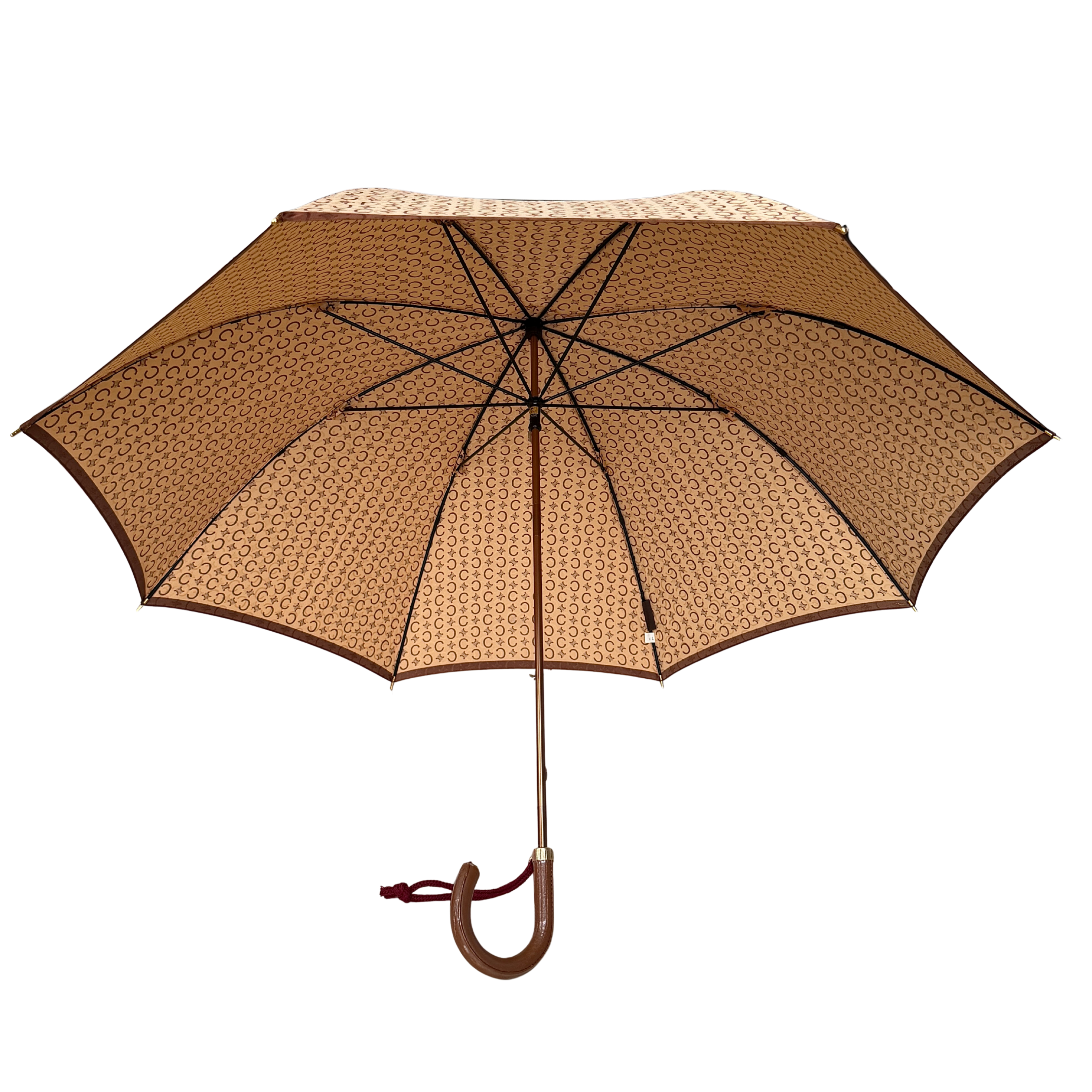 Celine Macadam Monogram Umbrella in brown and beige with classic curved handle and signature all-over logo pattern.