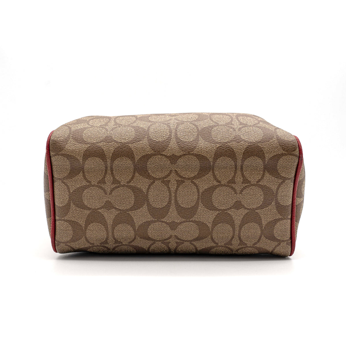 Coach Mini Bennett Boston bag in signature beige canvas with red leather trim, shown with detachable crossbody strap.