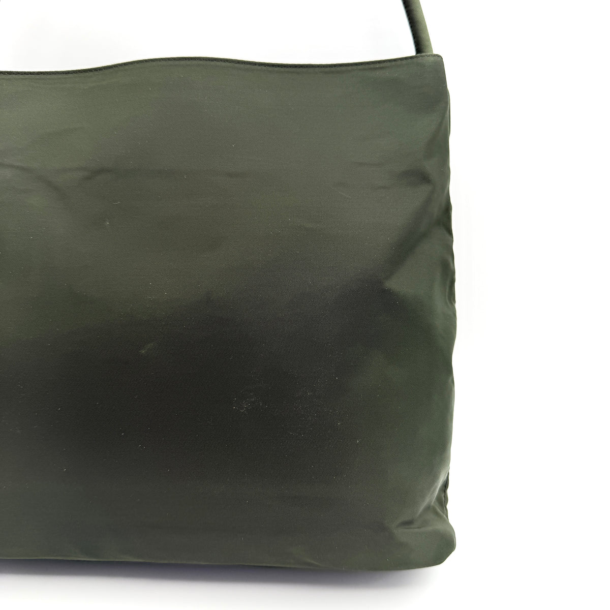Prada Tessuto Nylon City Tote Bag in dark green nylon with double handles and signature triangle logo plaque on the front.