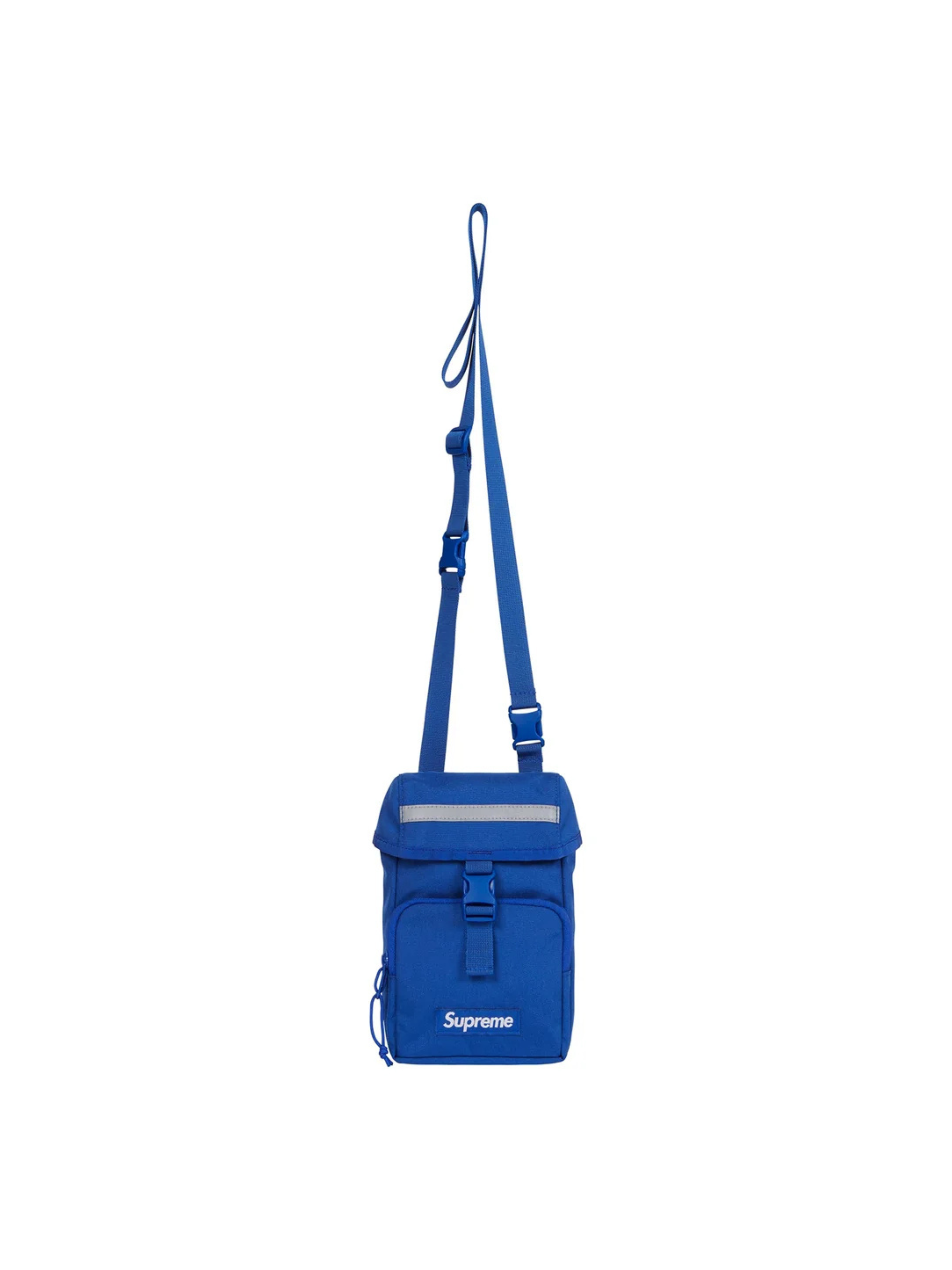 Supreme Camera Bag Blue FW24 in durable Cordura nylon with reflective strip, buckle flap, and bold white logo