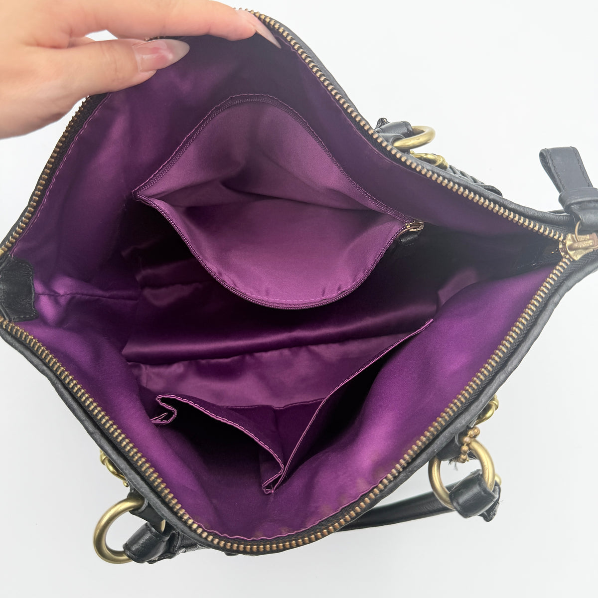 Coach Sophia Madison Pleated Shoulder Bag in black leather with gold hardware, displayed with detachable strap and dust bag.