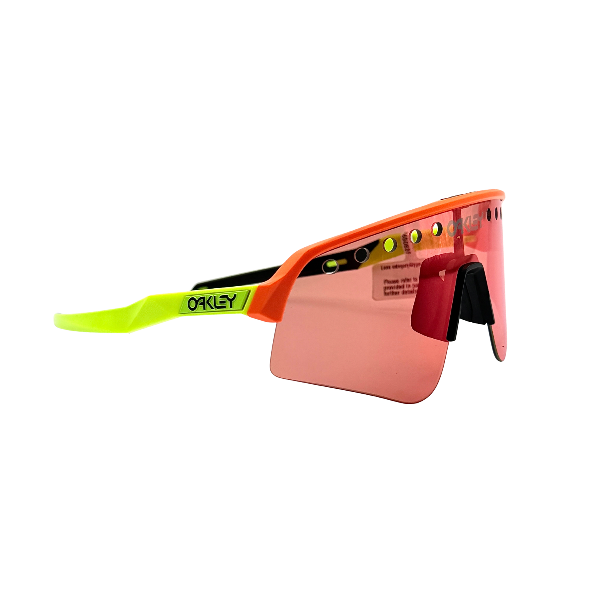 Oakley Sutro Lite Sweep sunglasses in neon yellow and orange with Prizm Trail Torch shield lens, displayed with box and case.