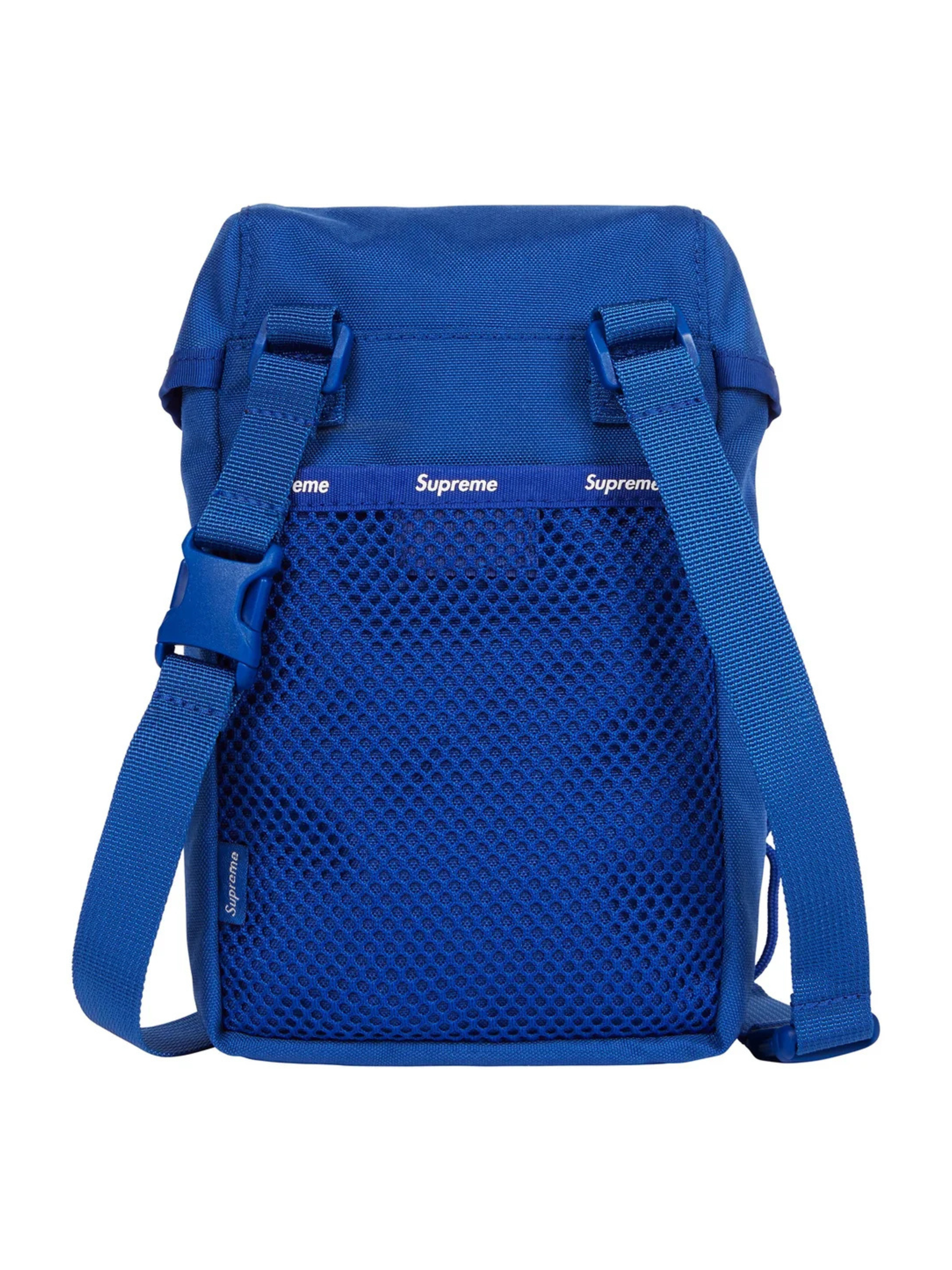 Supreme Camera Bag Blue FW24 in durable Cordura nylon with reflective strip, buckle flap, and bold white logo