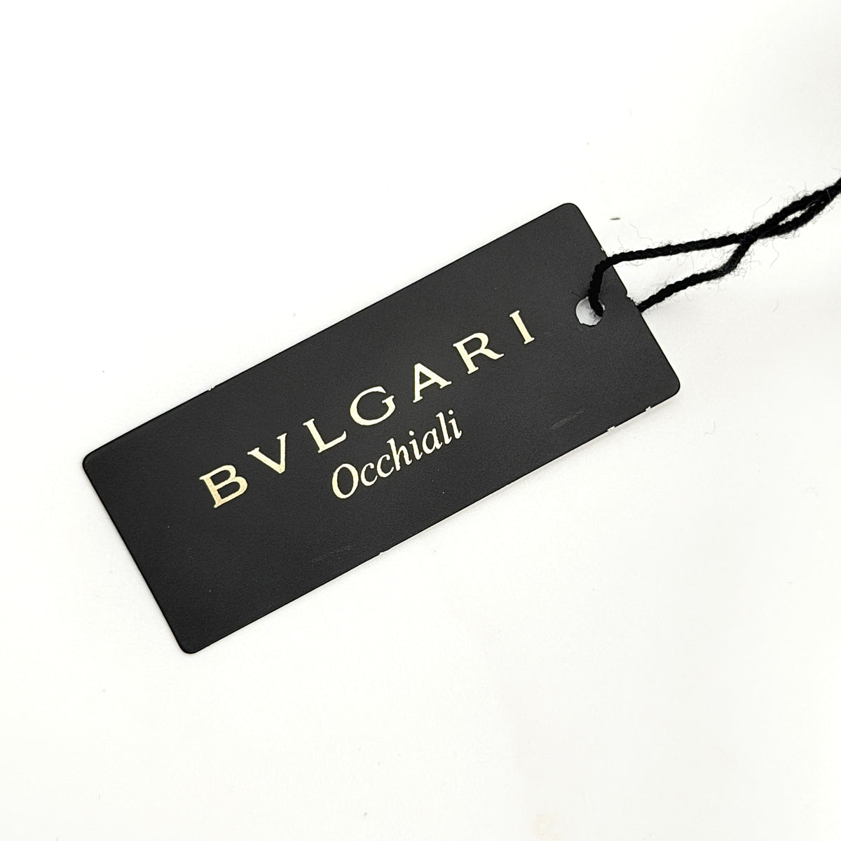 Bvlgari 808 sunglasses in tortoiseshell brown acetate displayed with original case and cloth.