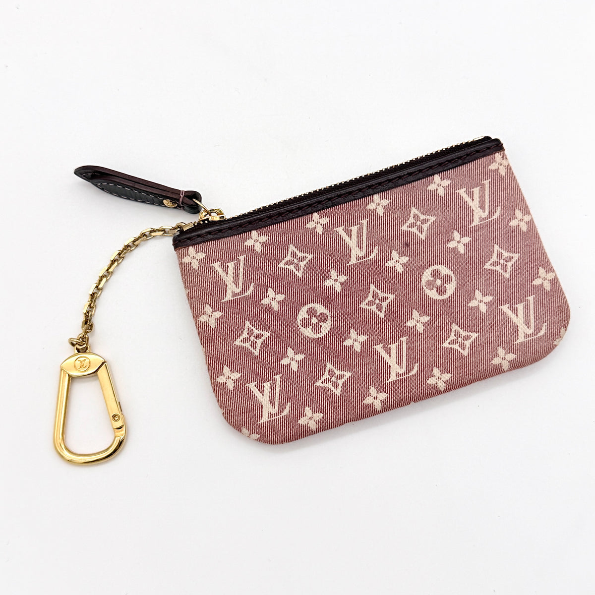 Louis Vuitton Monogram Idylle Pochette Cles Coin Case in sepia pink canvas with gold-tone hardware and monogram pattern.