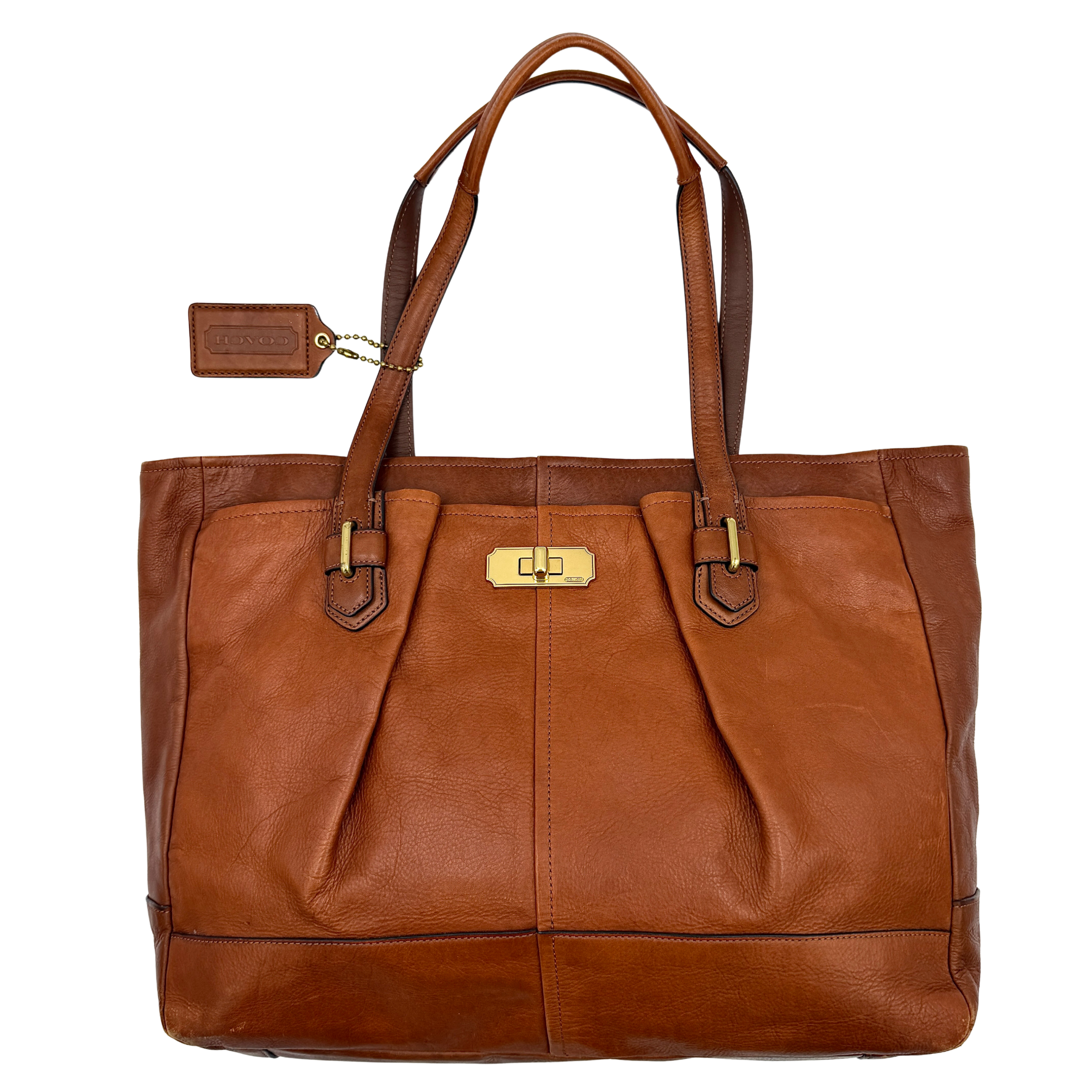 Coach Chelsea Jayden Shoulder Bag in rich brown grained leather, with gold-tone turn-lock and subtle pleated detailing.