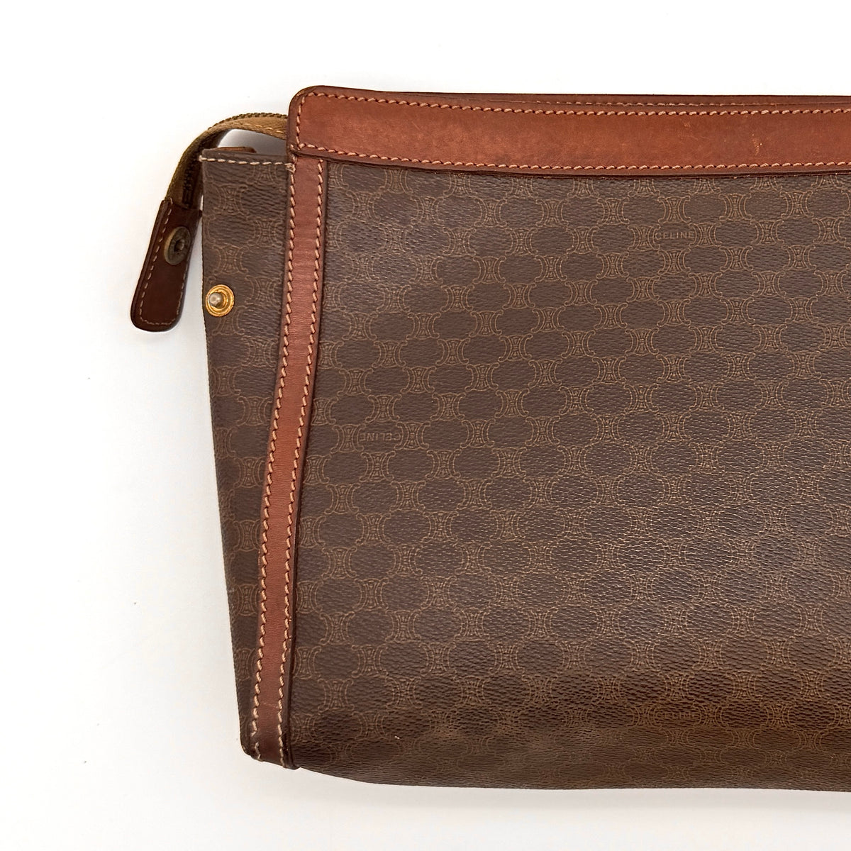 Celine Triomphe Macadam Clutch Bag in brown coated canvas with leather trim, photographed on a white background.