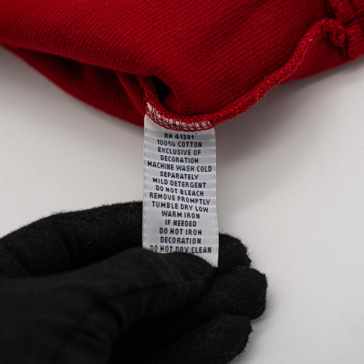 Polo Ralph Lauren red quarter zip mockneck pullover sweater with navy pony embroidery, laid flat on a white background.