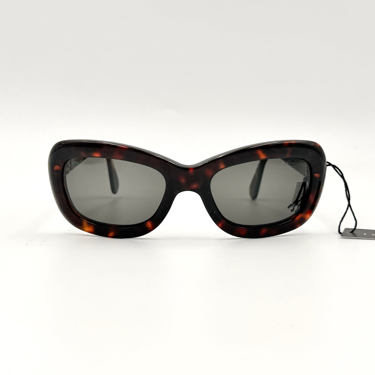 Bvlgari 808 sunglasses in tortoiseshell brown acetate displayed with original case and cloth.