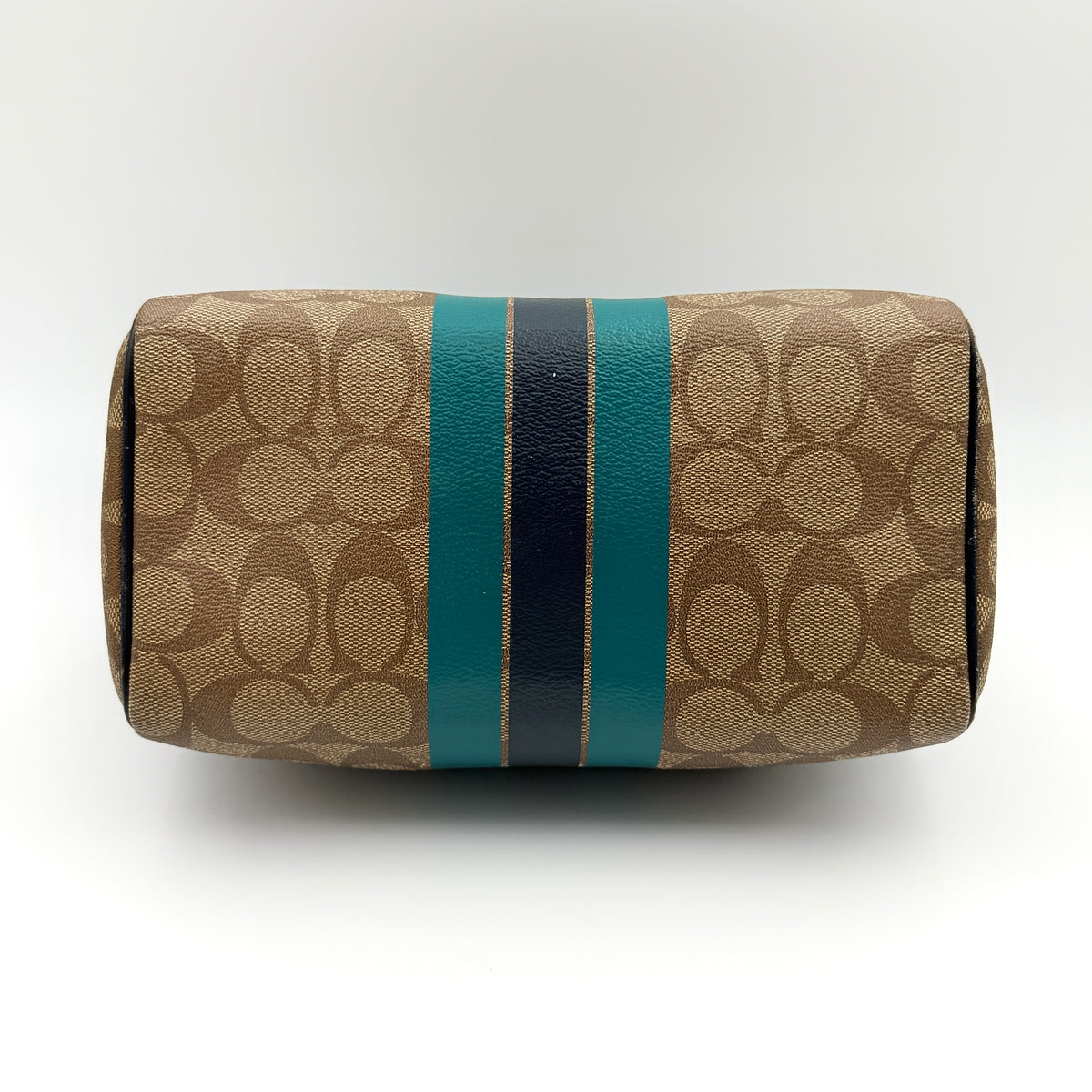 Coach Signature Mini Bennett Boston Bag in monogram canvas with navy and teal varsity stripes and dark navy leather trim.