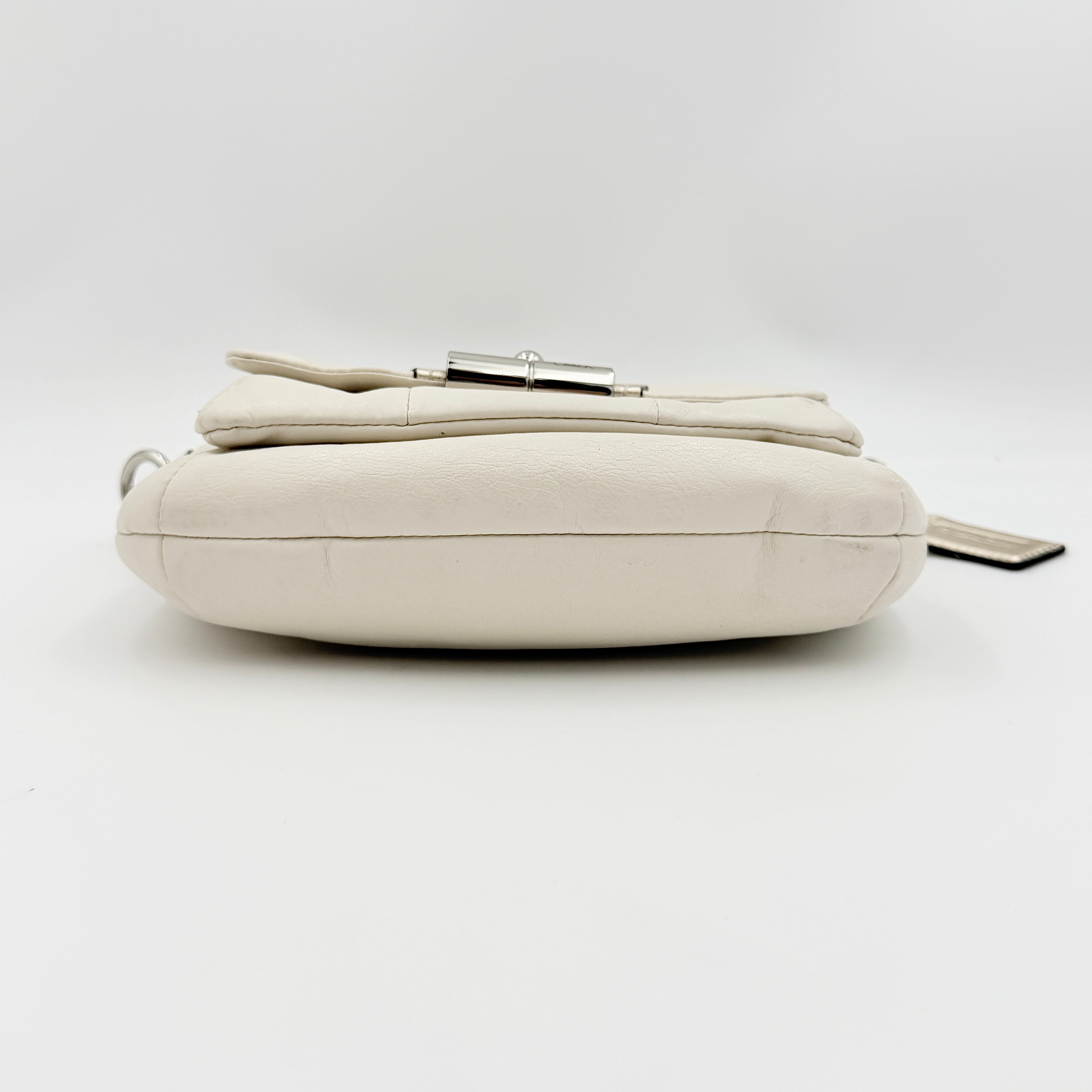 Coach Kristin Hobo Shoulder Bag in ivory leather with silver-tone hardware and a structured short strap.