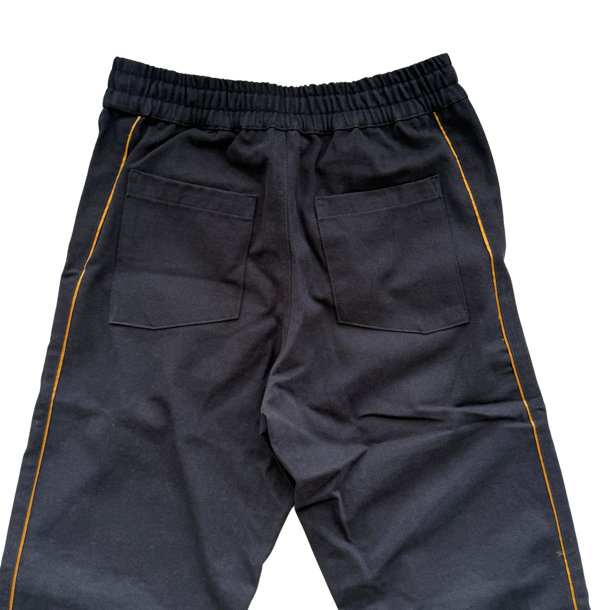 Rhude Piped Twill Pant in black cotton twill with ochre piping and a relaxed drawstring waist.