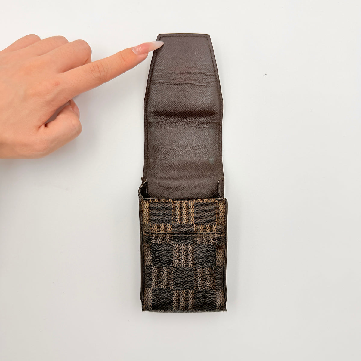 Louis Vuitton Damier Ebene Cigarette Case in brown coated canvas with original box, dust bag, and cards displayed.