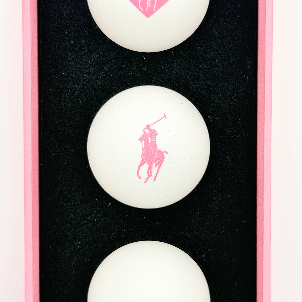 Ralph Lauren Pink Pony table tennis balls set of three, presented in a pink gift box with signature Polo designs.