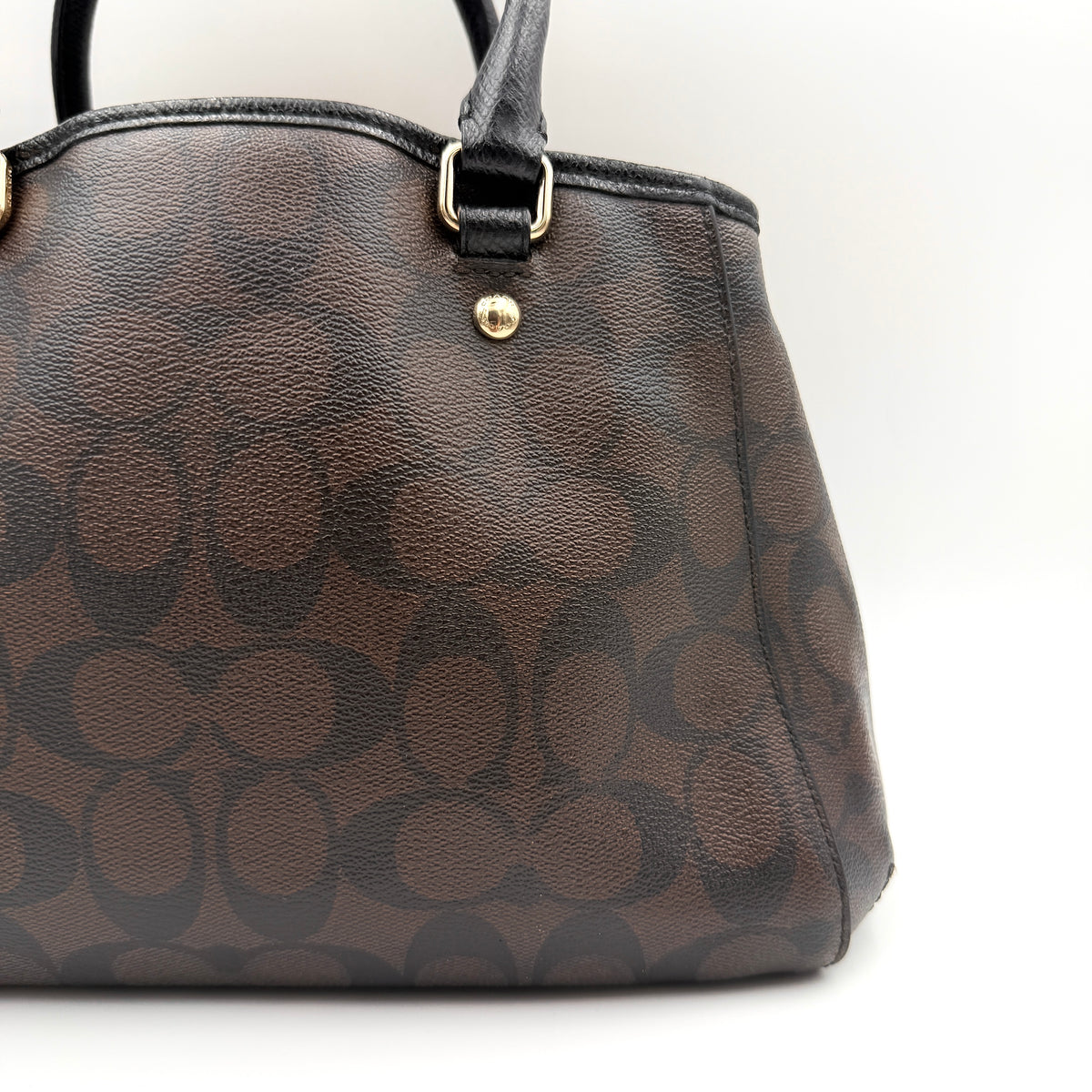 Coach 2Way Signature Margot Carryall Satchel in brown with black leather handles and gold hardware, shown with detachable strap.