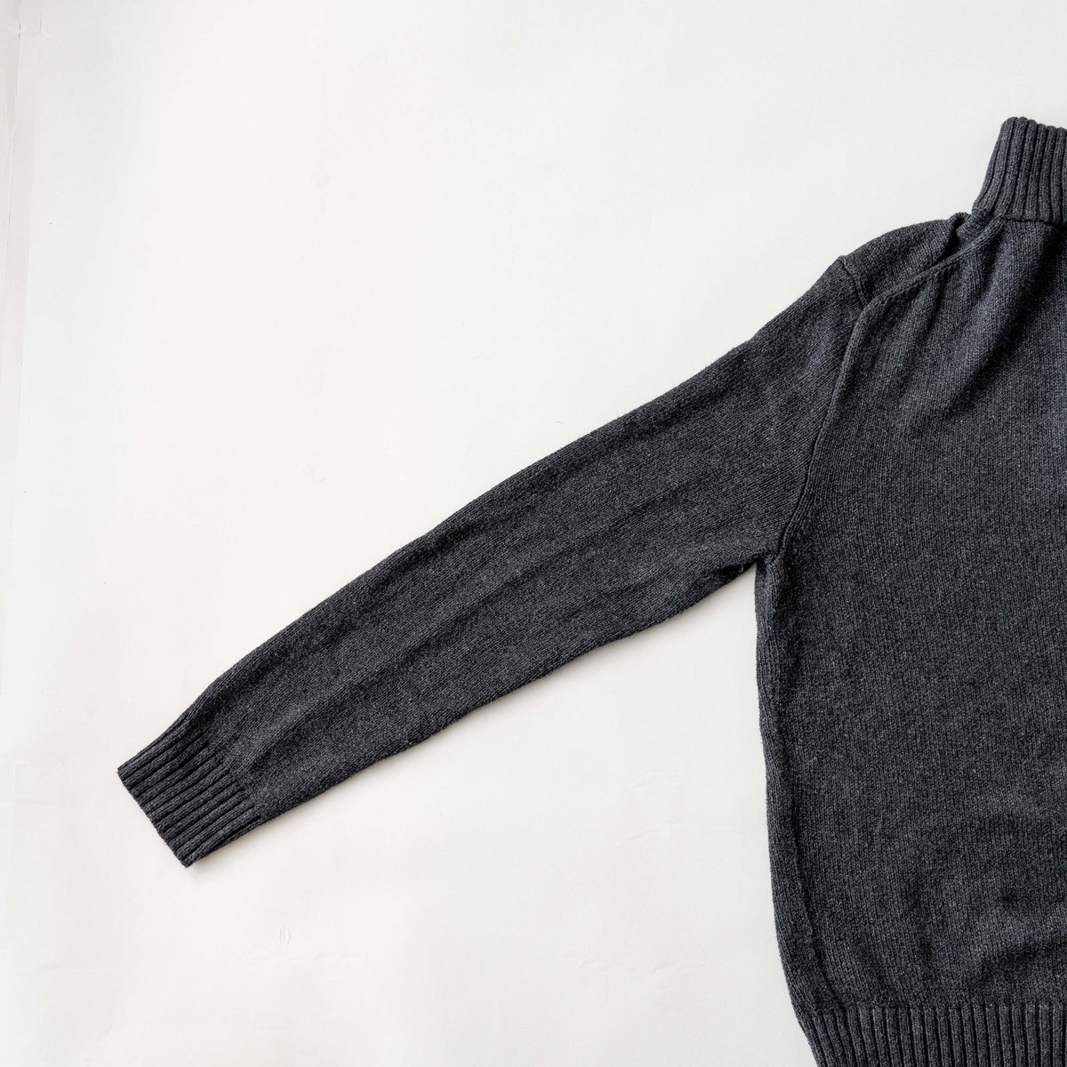 Dark grey Polo Ralph Lauren quarter zip mockneck pullover sweater with ribbed collar and green pony logo.
