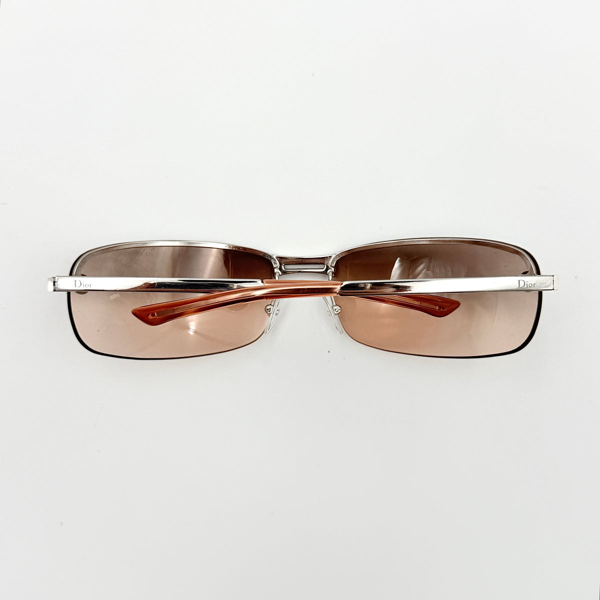 Dior Adiorable 3/L rimless sunglasses with rose pink gradient lenses and silver frame, presented with Dior hard case.
