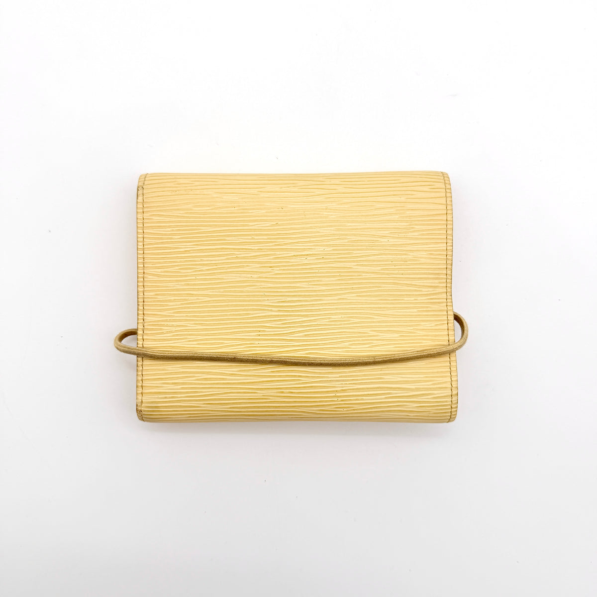 Louis Vuitton Epi Portefeuille Élastique Trifold Wallet in Vanilla Cream with dust bag, presented against a clean white background.