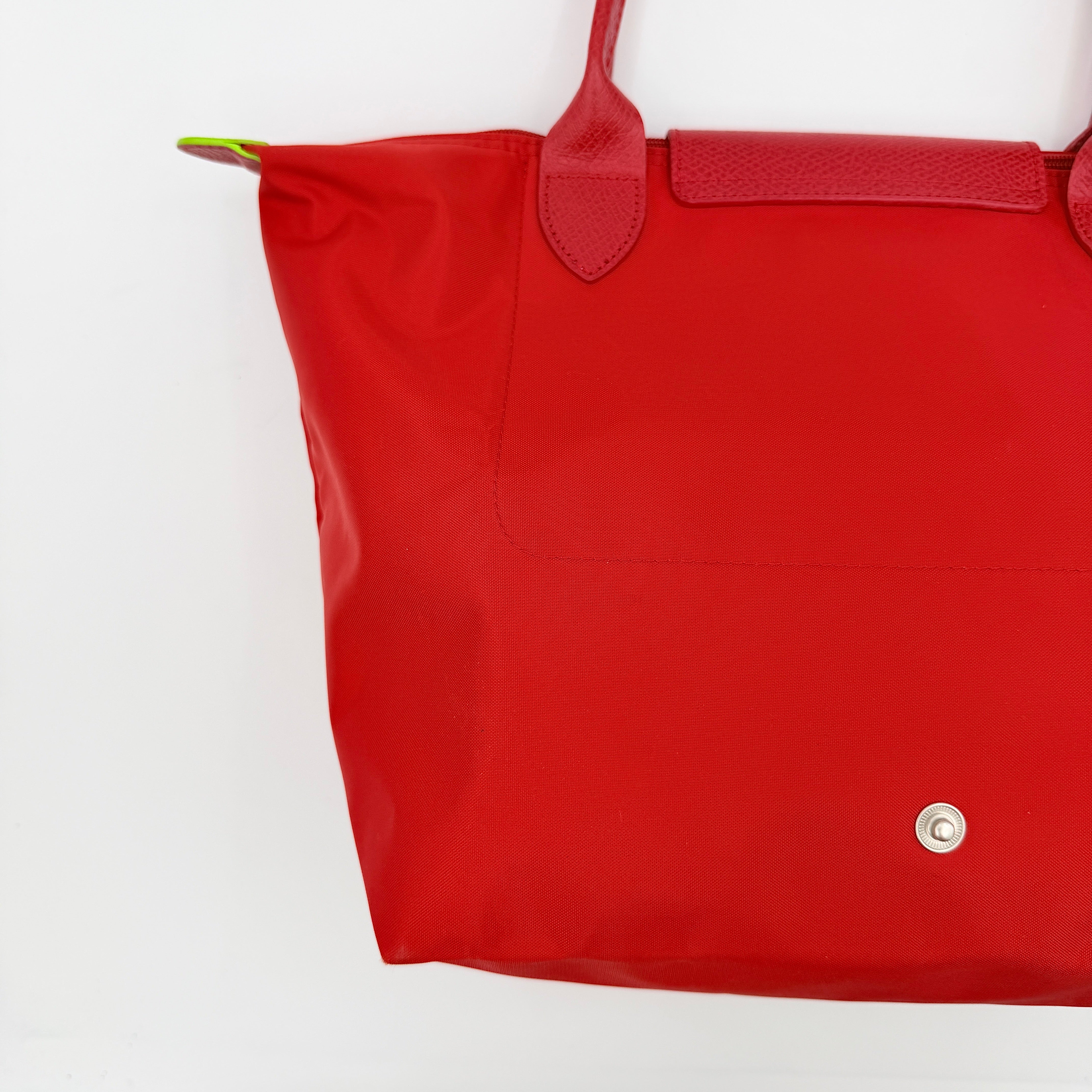 Longchamp Le Pliage Club tote bag in red nylon with tonal leather accents and silver hardware.