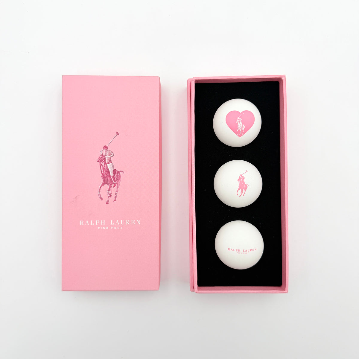 Ralph Lauren Pink Pony table tennis balls set of three, presented in a pink gift box with signature Polo designs.