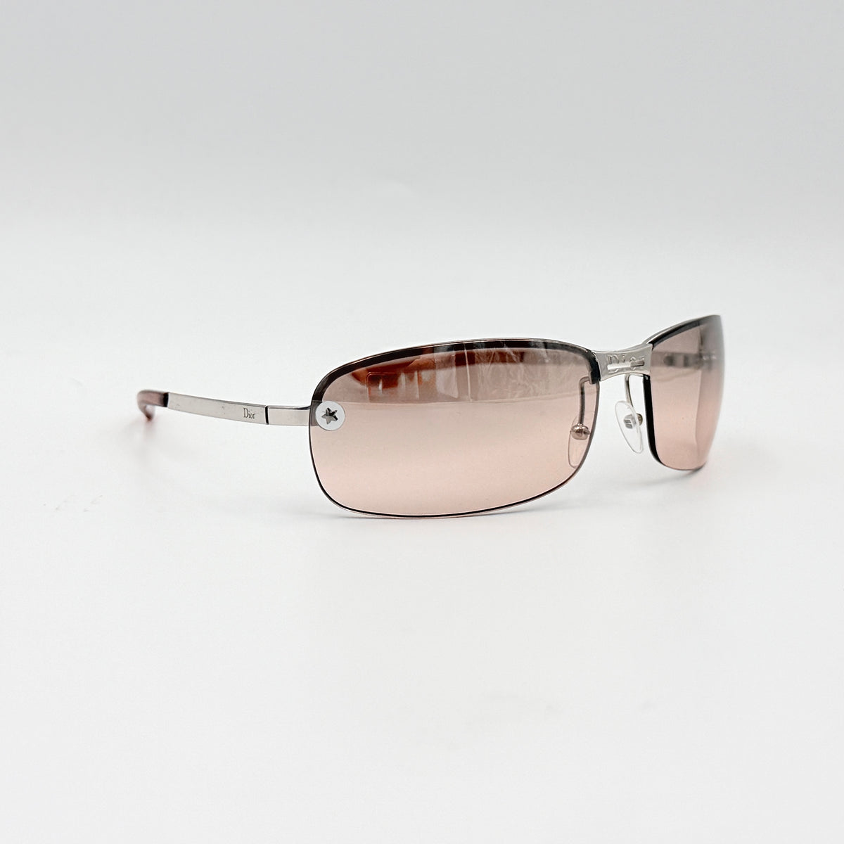 Dior Adiorable 3/L rimless sunglasses with rose pink gradient lenses and silver frame, presented with Dior hard case.