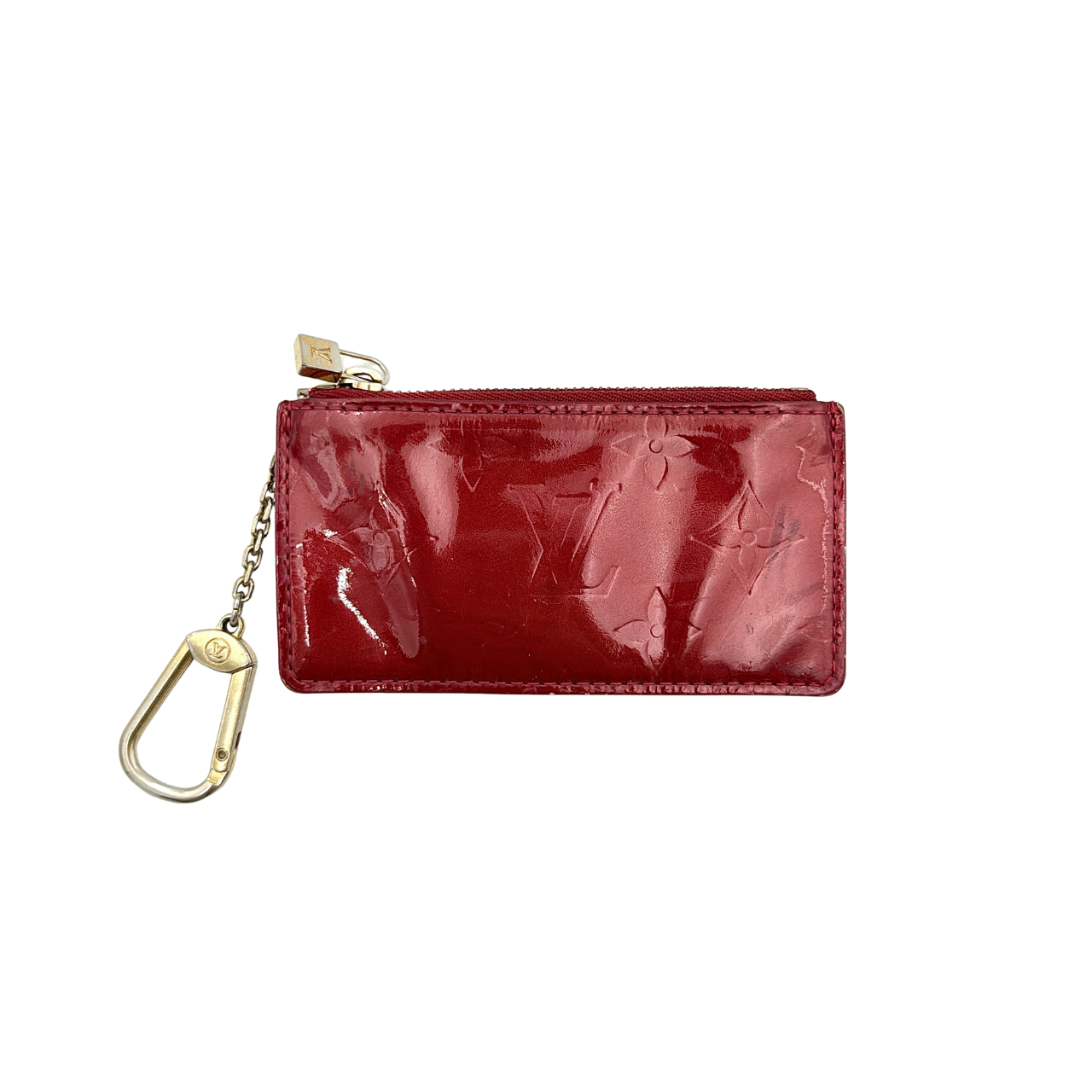 Louis Vuitton Vernis Coin Case in amethyst red patent leather with gold-tone key chain and zip closure, embossed with monogram pattern.