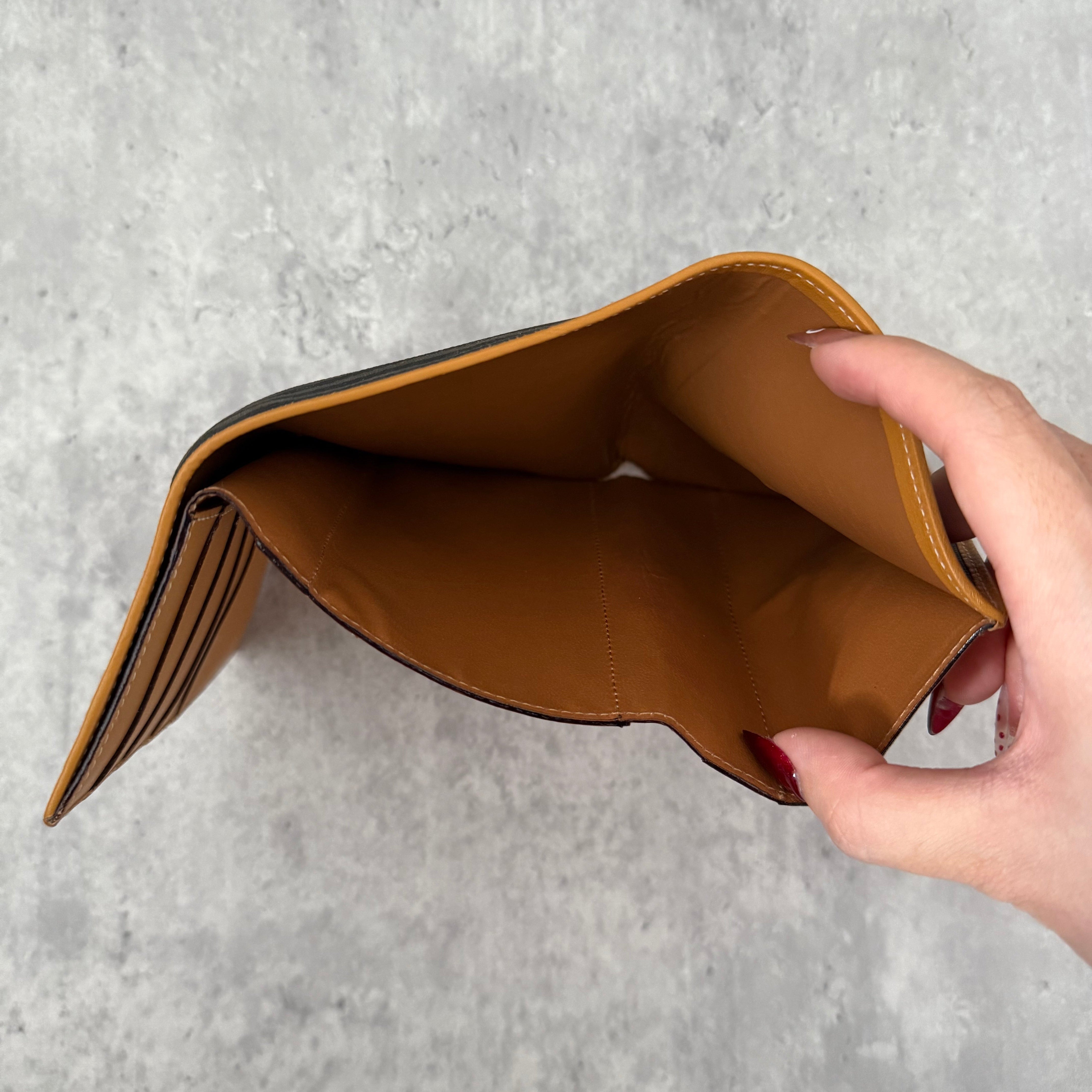 Fendi Canvas Striped Vintage Wallet in brown and black with tan leather trim and gold-tone logo clip