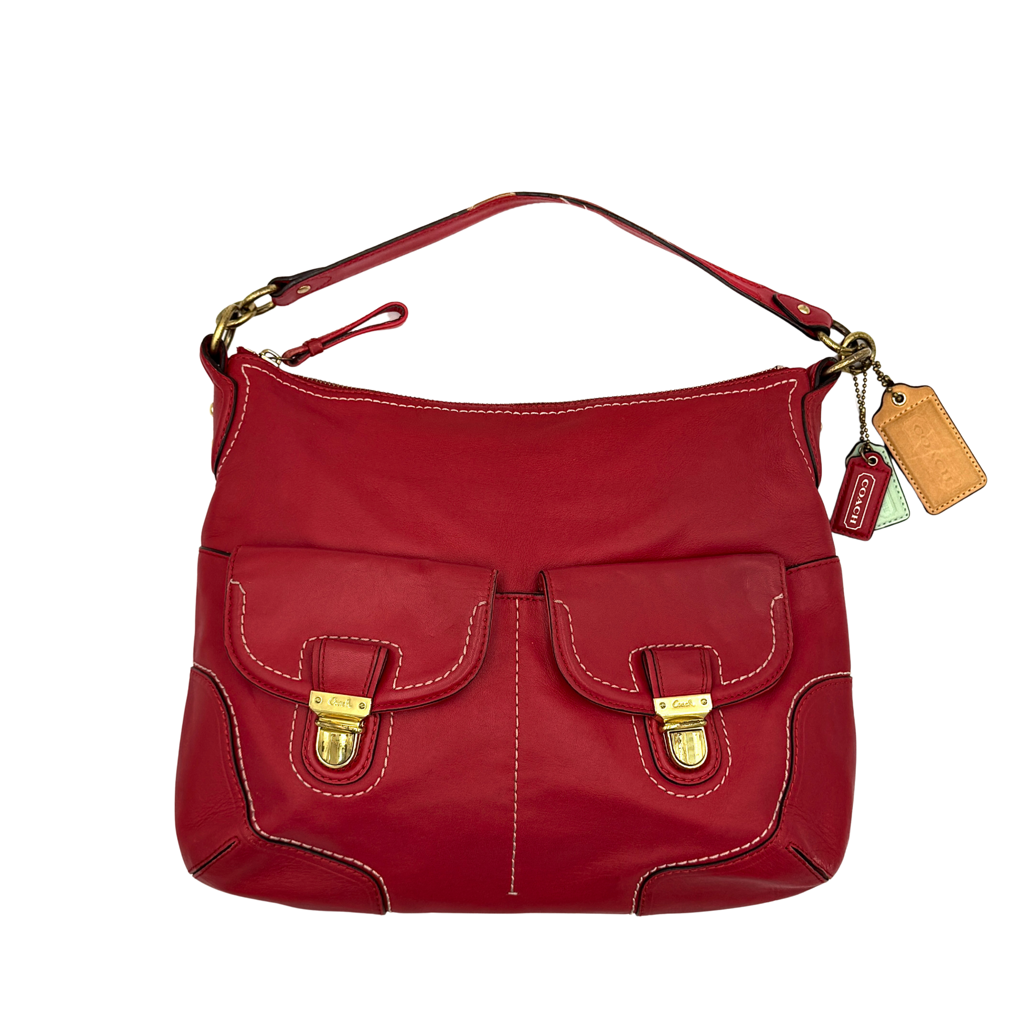 Coach Ashley Double Pocket Hobo in vibrant red leather, featuring distinctive front pockets, gold-tone hardware, and signature Coach hangtags.