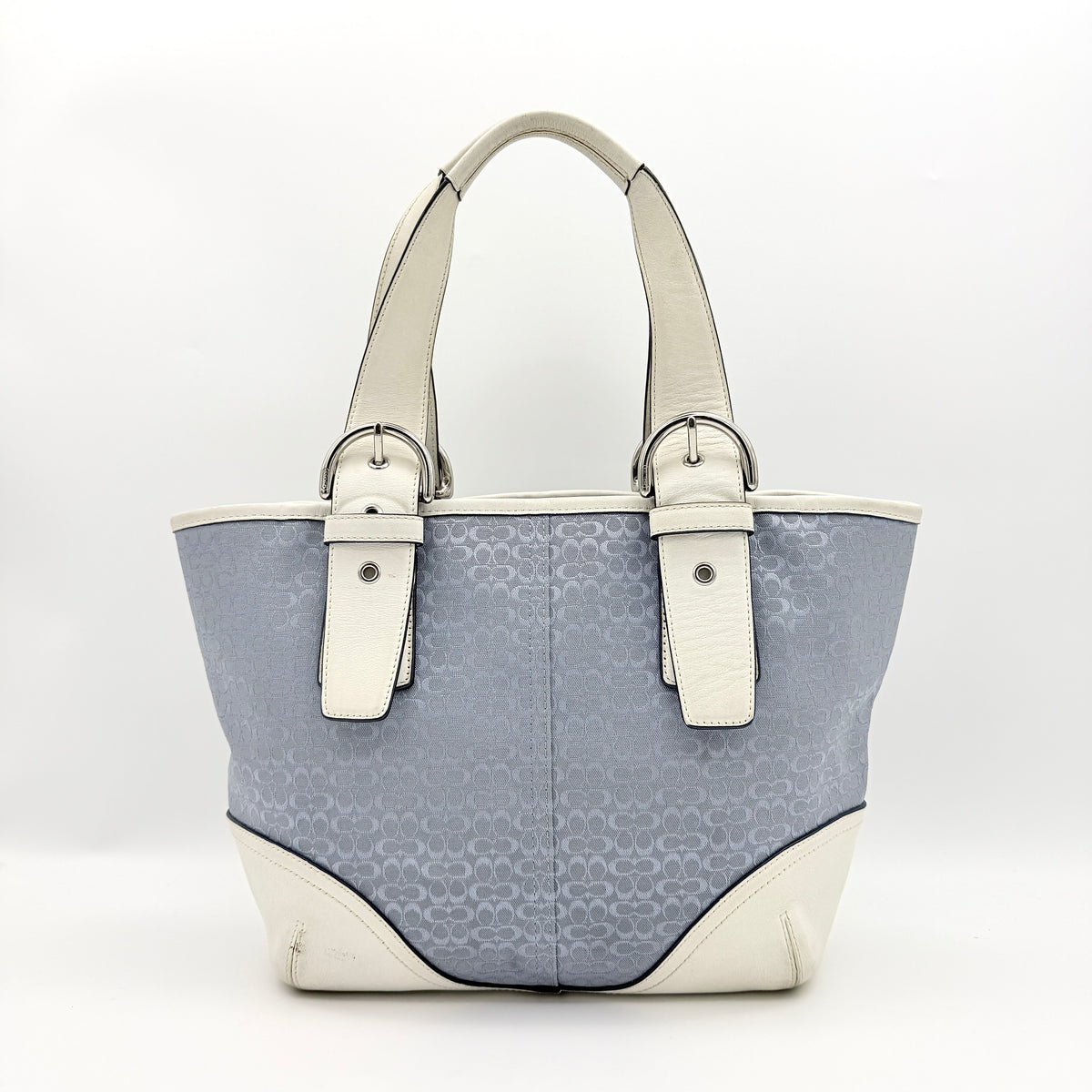 Coach Y2K Signature Soho Buckle Tote in light blue jacquard with white leather trim and silver-tone hardware.