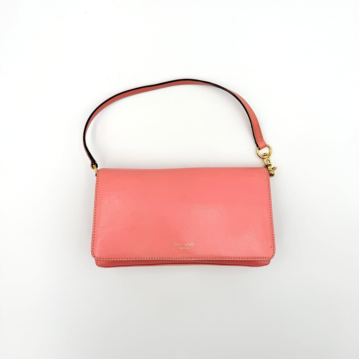 Kate Spade Morgan East West Shoulder Bag in smooth pink leather with gold-tone hardware and a green interior, displayed on white background.