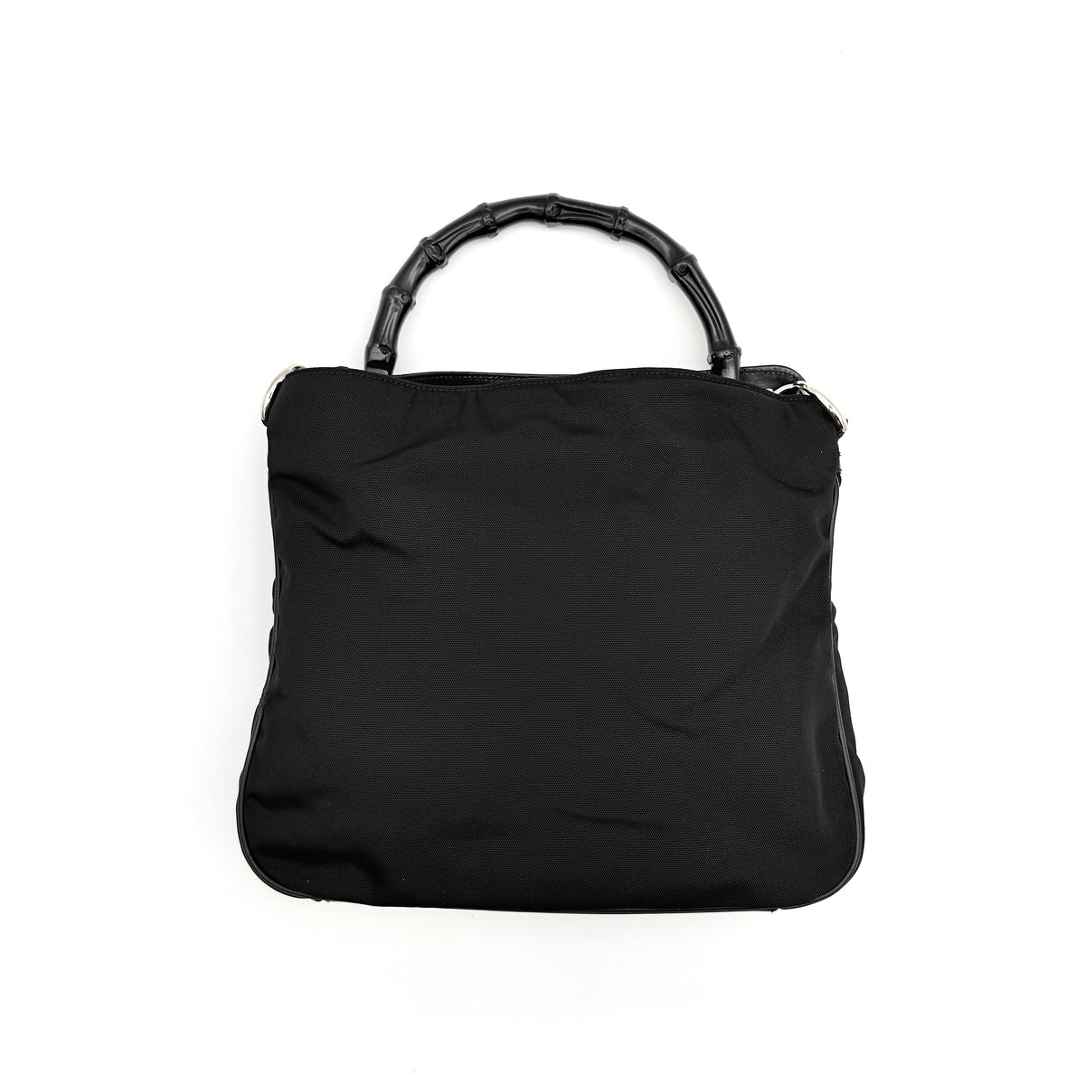 Gucci black nylon shoulder bag with bamboo handle and detachable strap shown with dust bag.