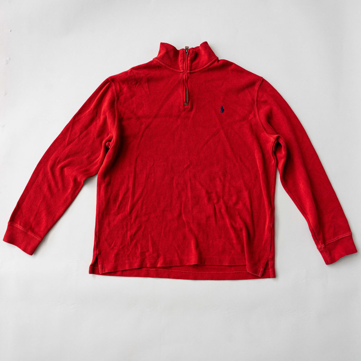 Polo Ralph Lauren red quarter zip mockneck pullover sweater with navy pony embroidery, laid flat on a white background.