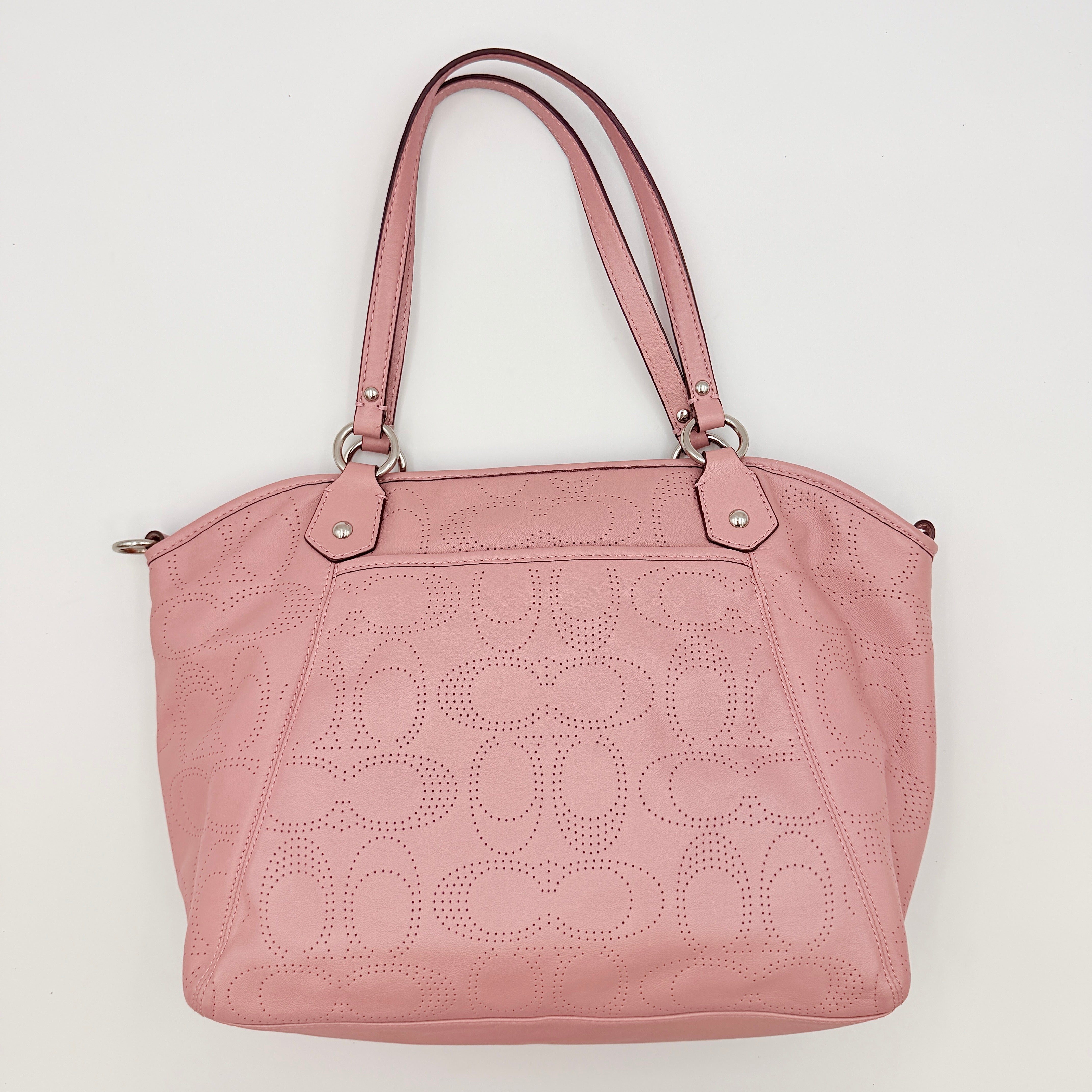 Coach 2Way Perforated Shoulder Bag in soft pink leather with silver hardware and detachable strap, displayed on a white background.
