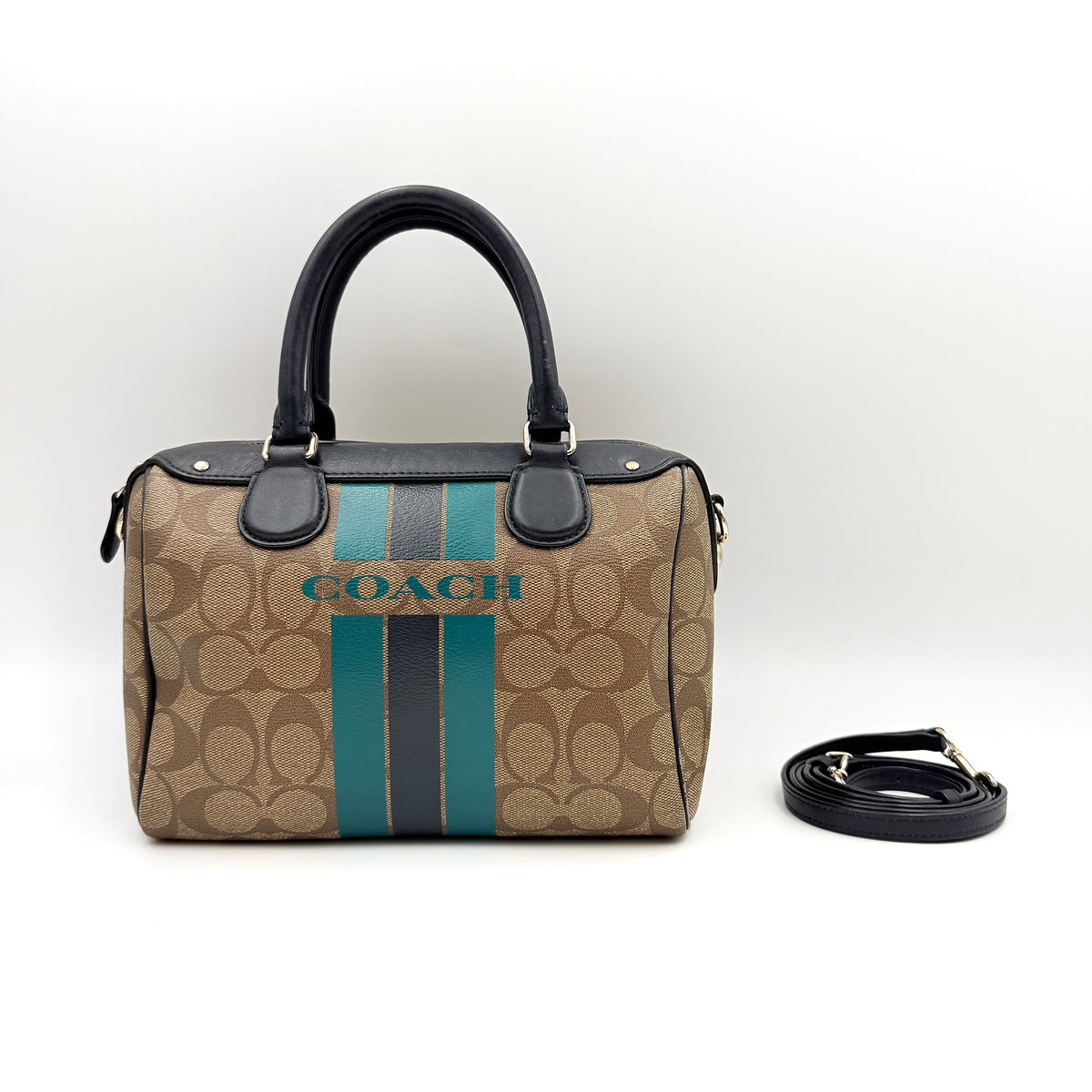 Coach Signature Mini Bennett Boston Bag in monogram canvas with navy and teal varsity stripes and dark navy leather trim.