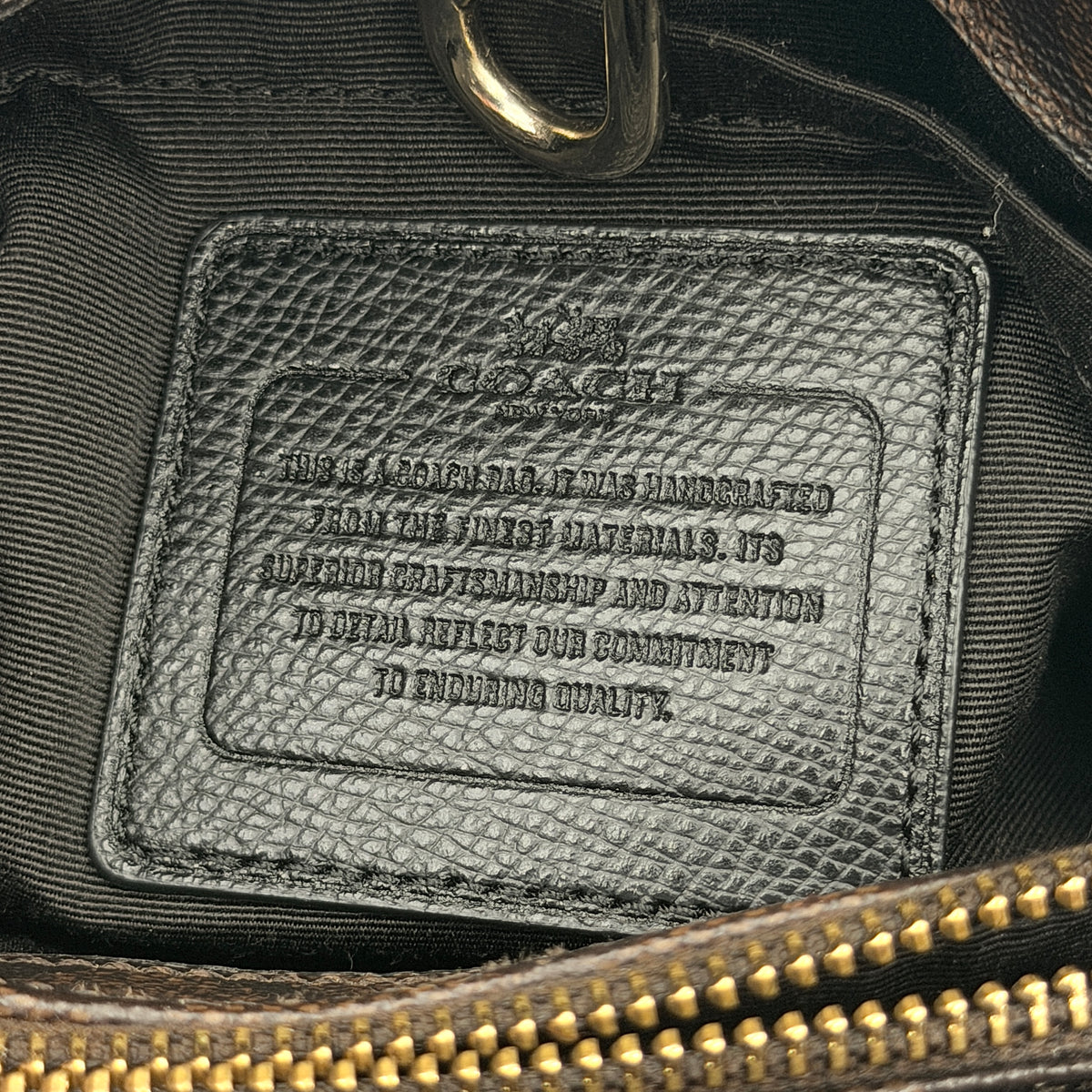 Coach 2Way Signature Margot Carryall Satchel in brown with black leather handles and gold hardware, shown with detachable strap.