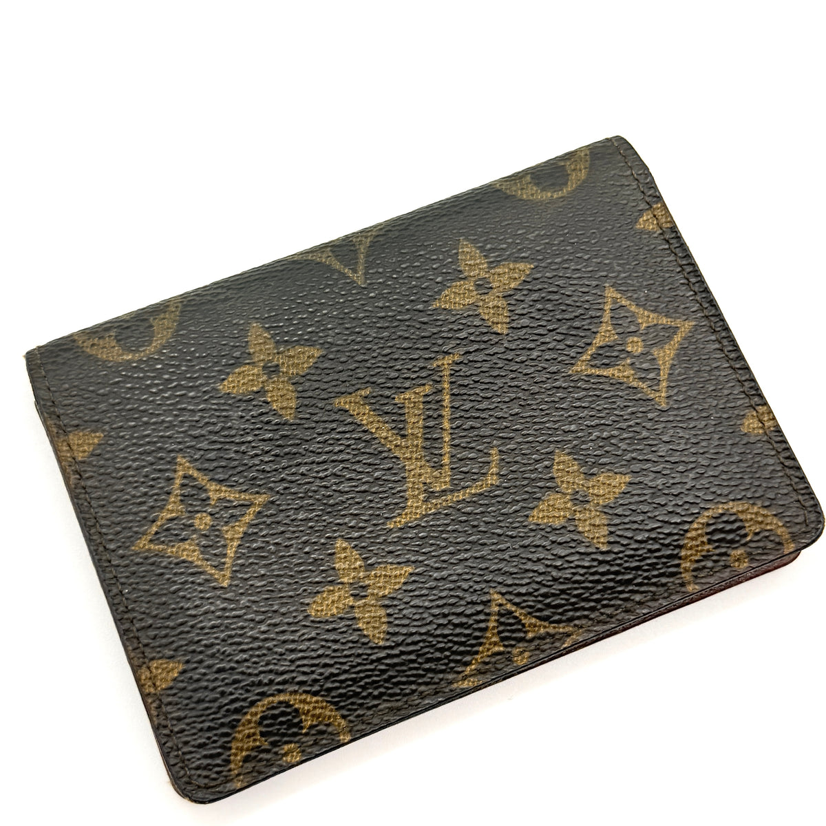 Louis Vuitton Monogram ID Card Holder in brown coated canvas with signature pattern and brown leather interior.