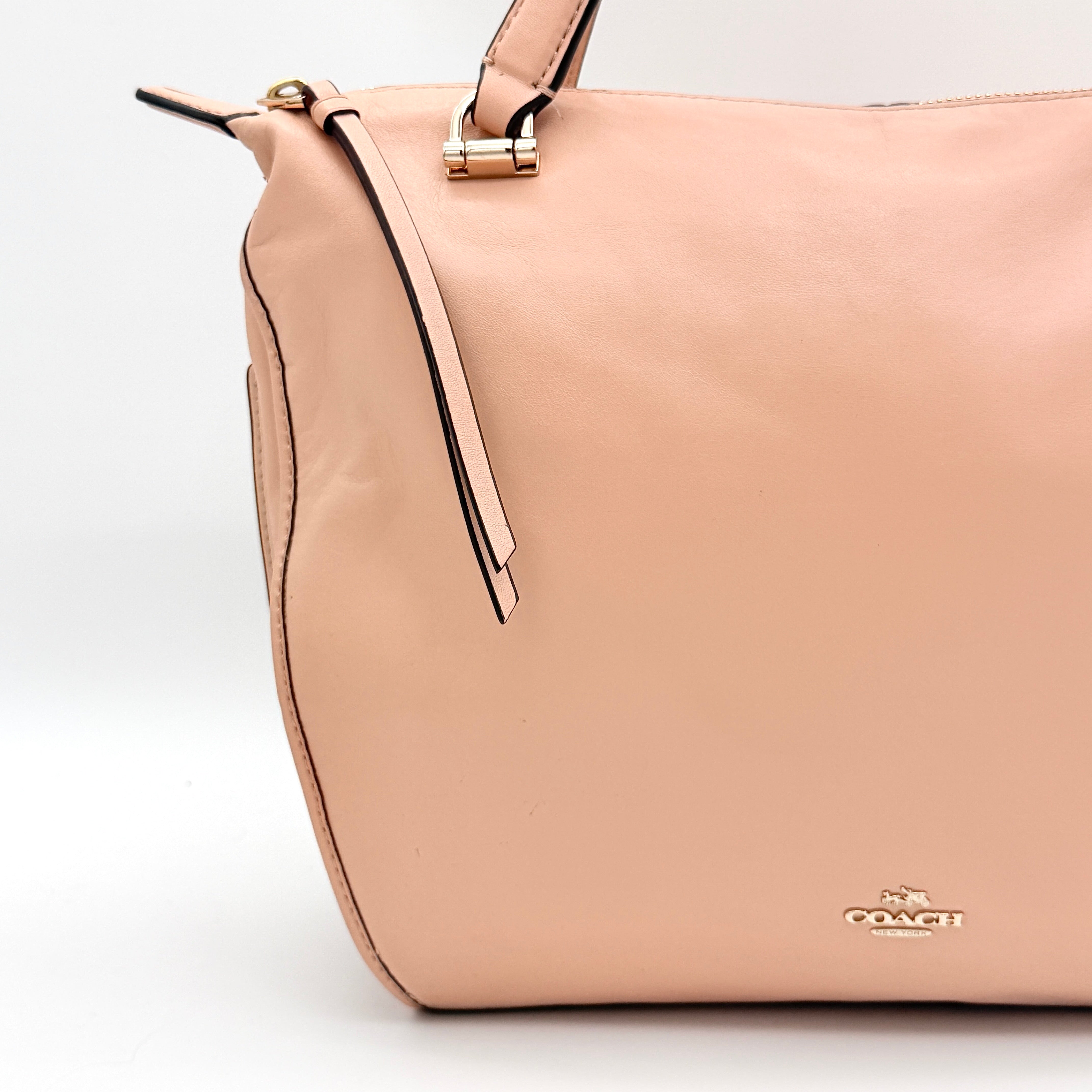 Coach Madison Smythe Satchel in blush pink leather with gold-tone hardware and detachable strap.
