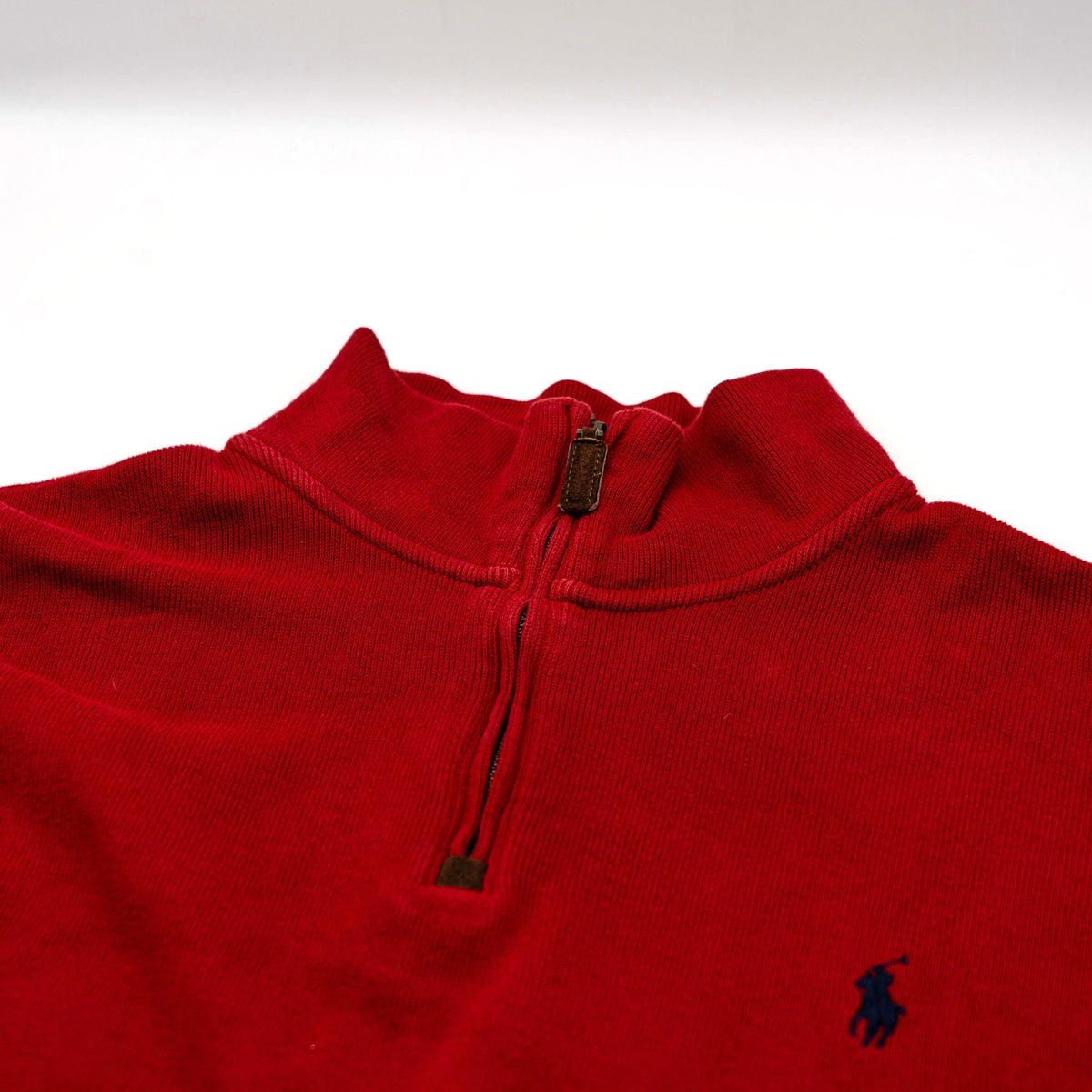 Polo Ralph Lauren red quarter zip mockneck pullover sweater with navy pony embroidery, laid flat on a white background.