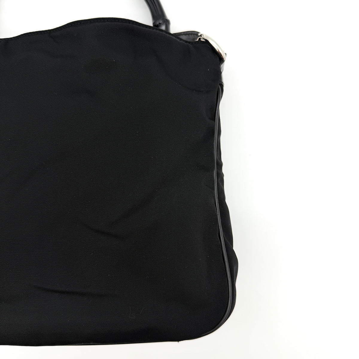 Gucci black nylon shoulder bag with bamboo handle and detachable strap shown with dust bag.