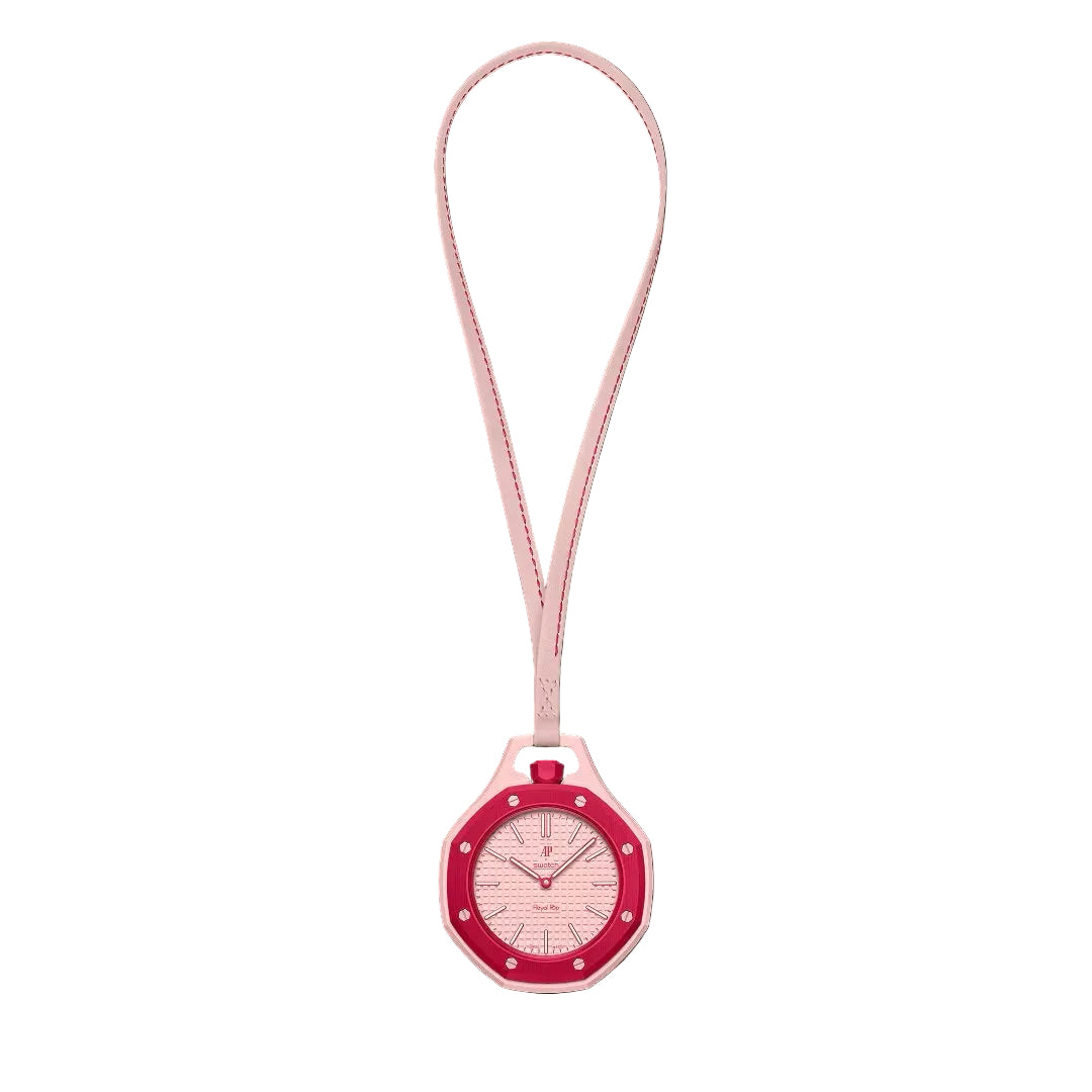 Swatch x Audemars Piguet Royal Pop Otto Rosso pendant watch in pink and red on a soft pink strap, featuring graphic dial details.