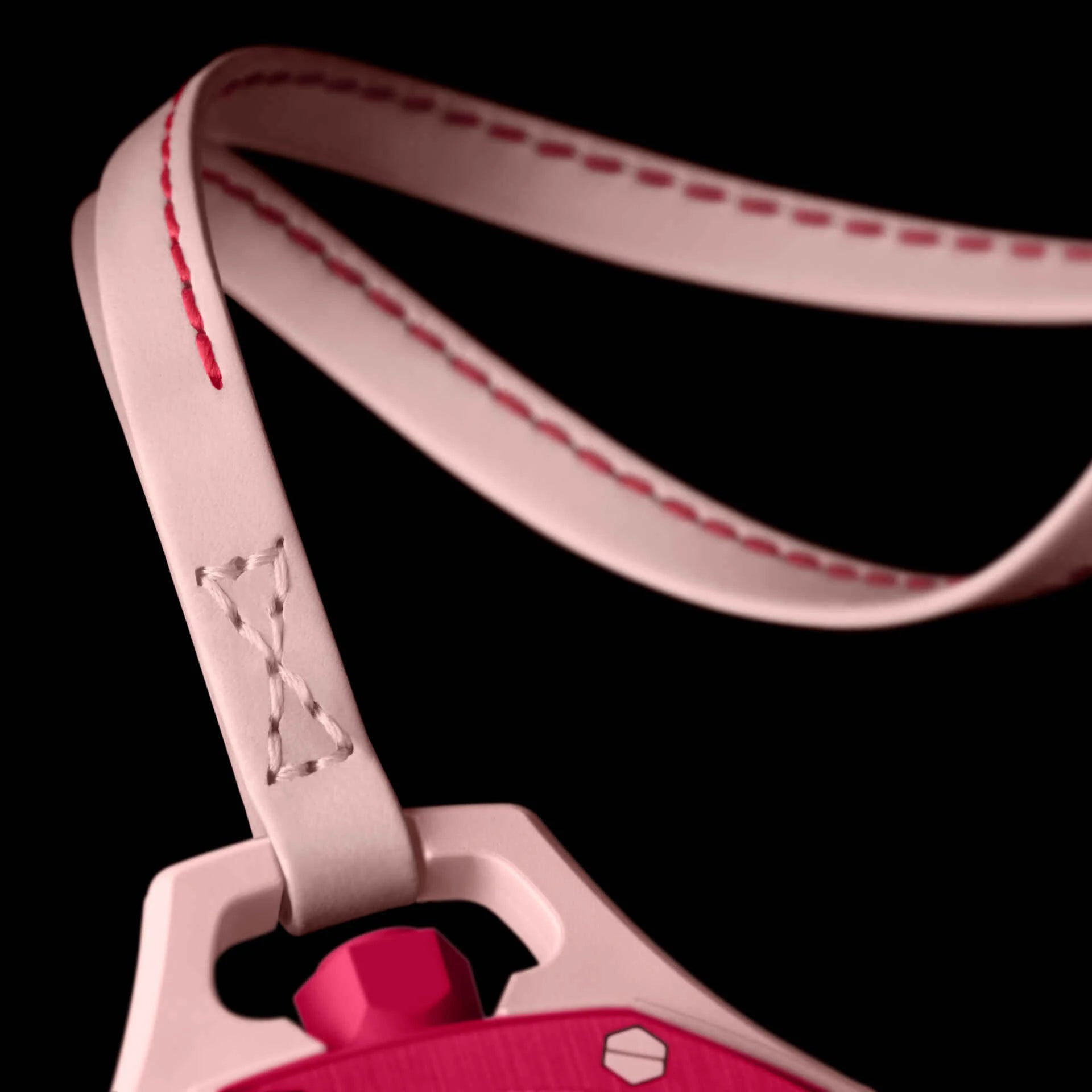 Swatch x Audemars Piguet Royal Pop Otto Rosso pendant watch in pink and red on a soft pink strap, featuring graphic dial details.