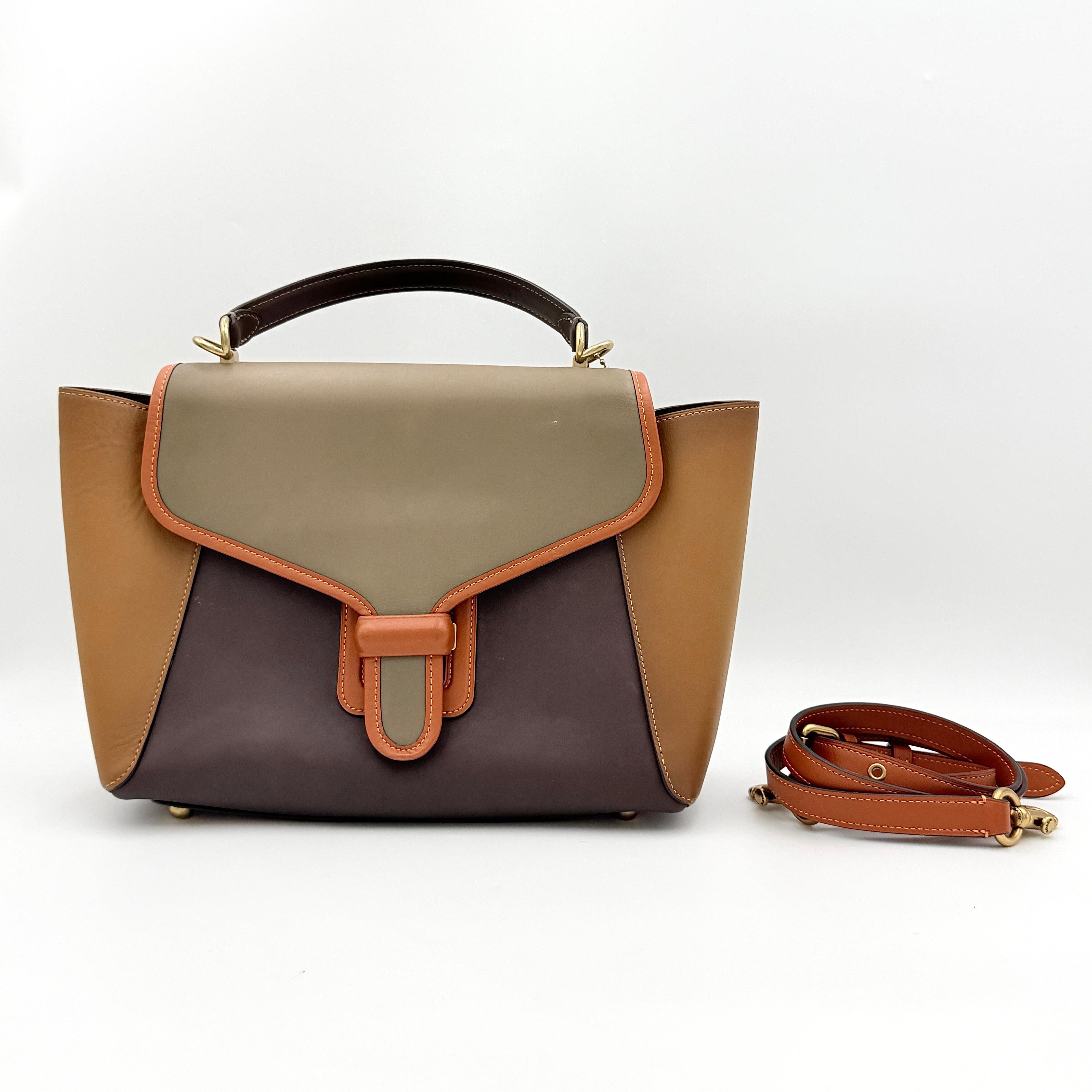 Coach 2Way Courier Carryall in brown and olive green colorblock leather with a structured silhouette, top handle, and detachable strap.
