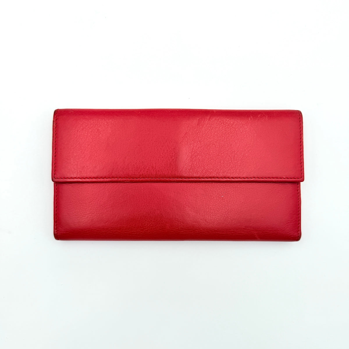 Fendi FF Logo Buckle Flap Continental Wallet in red leather with gold hardware, displayed closed on a white background.