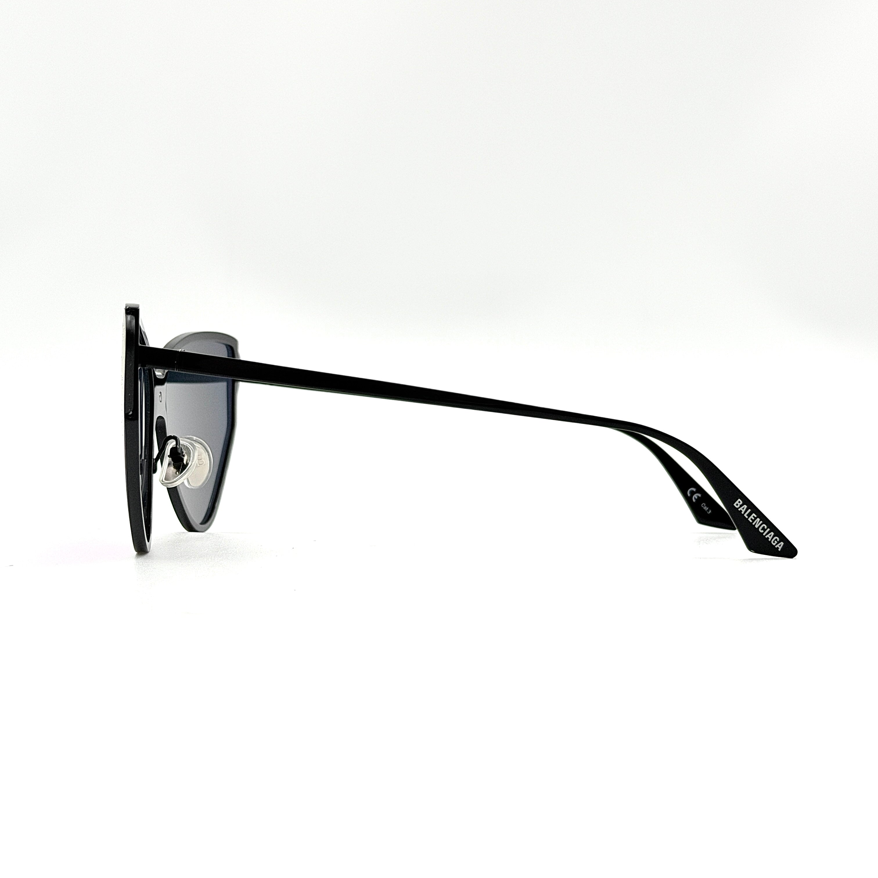 Balenciaga cat-eye sunglasses with purple mirrored lenses and black frame, featuring signature BB logo at the bridge.